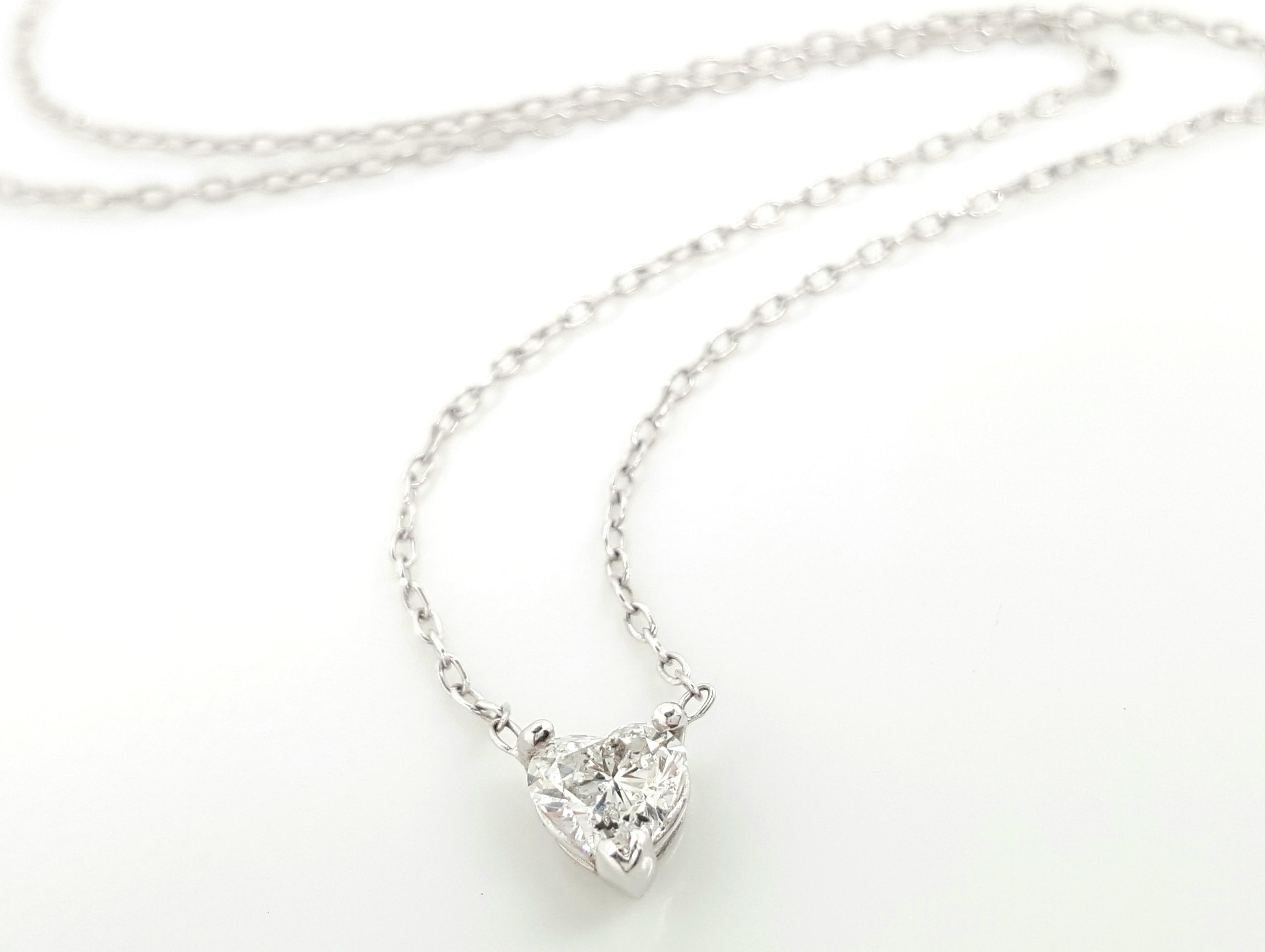 Diamond Heart Solitaire Pendant Necklace includes a 0.40 carat heart diamond center set in a basket setting hugged by 3 prongs. It is hanging on a 14K white gold 16” Cable chain. It is the perfect everyday necklace that is also great for
