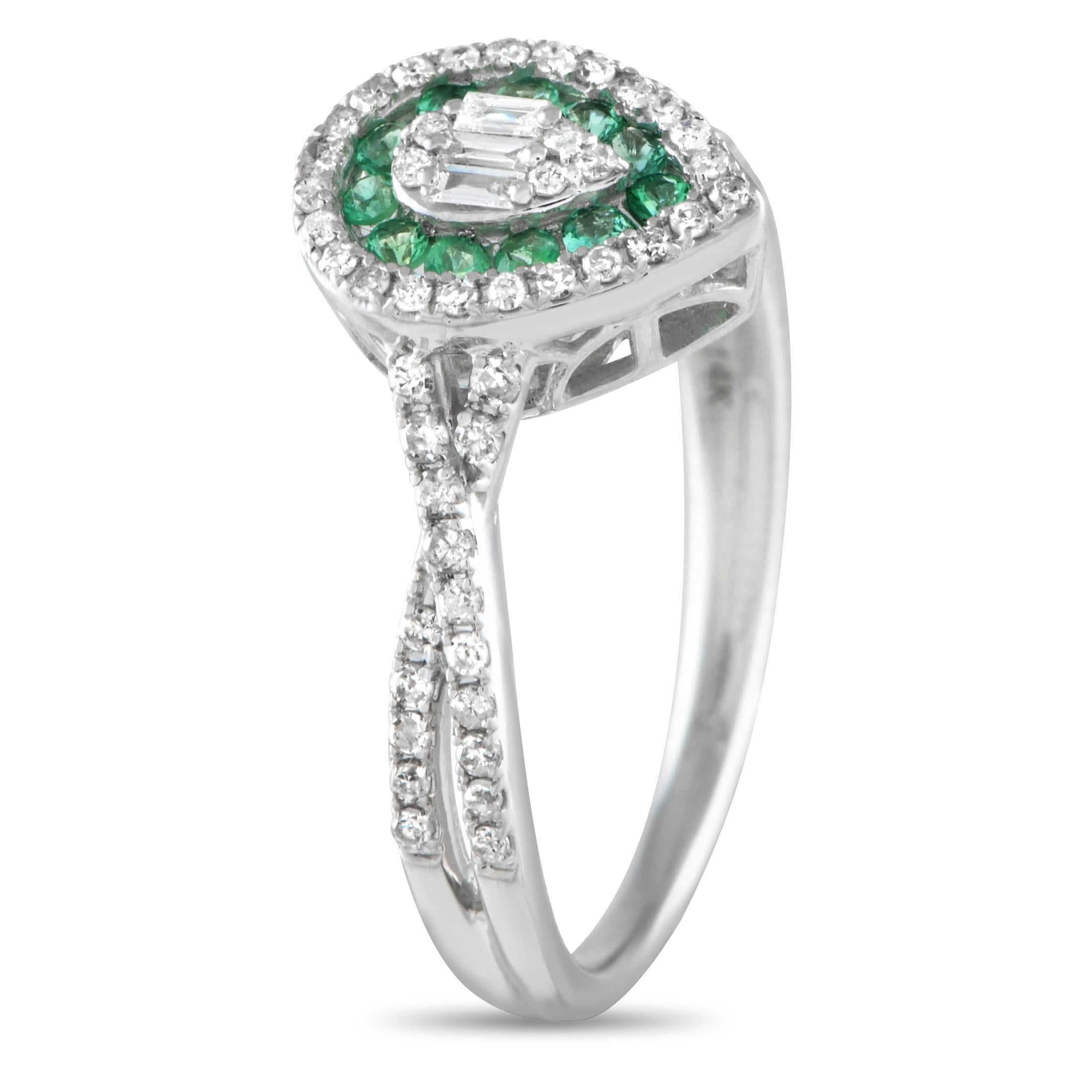 This diamond and emerald ring, offer an easy way to transform your look. Crafted from 14K white gold, the pear-shaped diamond clusters elegantly frame vibrant emeralds and a shimmering diamond center. This brand new 14K White Gold 0. 40 ct Diamond