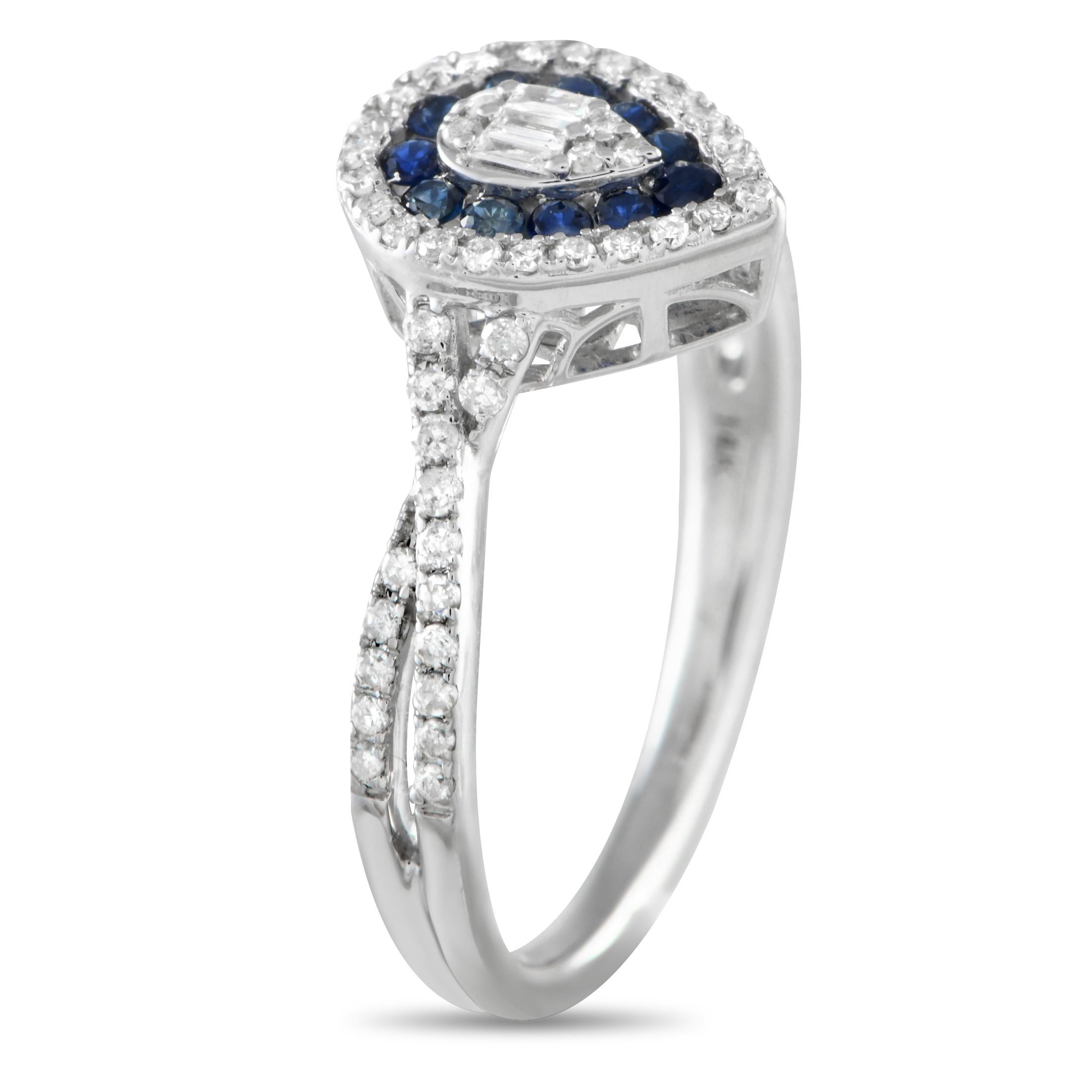 This diamond and sapphire ring, offers an easy way to transform your look. Crafted from 14K white gold, the pear-shaped diamond clusters elegantly frame vibrant blue sapphires with a shimmering diamond center. This brand new 14K White Gold 0. 40 ct
