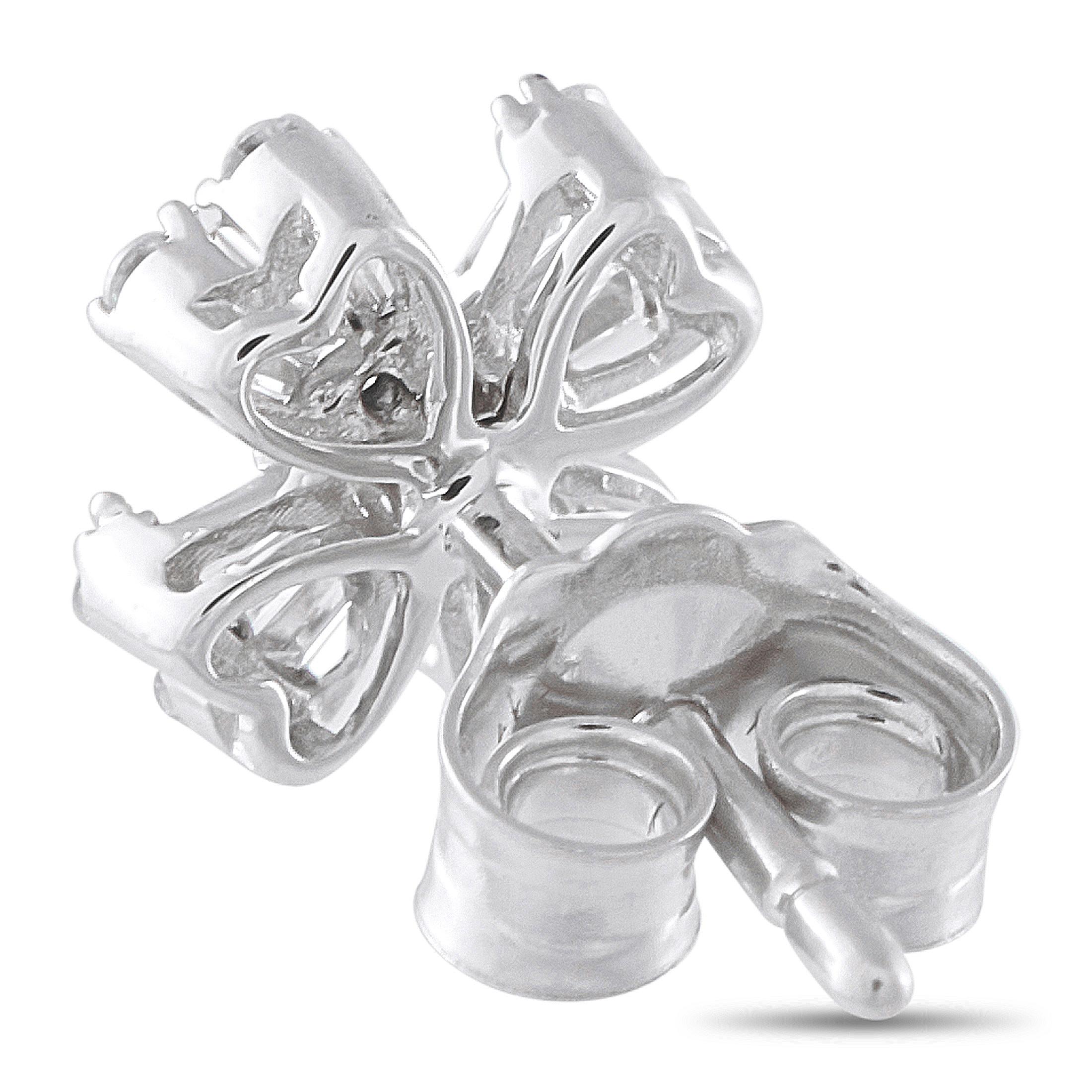 A stunning design makes these luxury earrings simply unforgettable. Ideal for everyday wear, Diamonds with a total weight of 0.40 carats make them come alive every time they catch the light. Set in 14K White Gold, each one measures 0.30 round.This