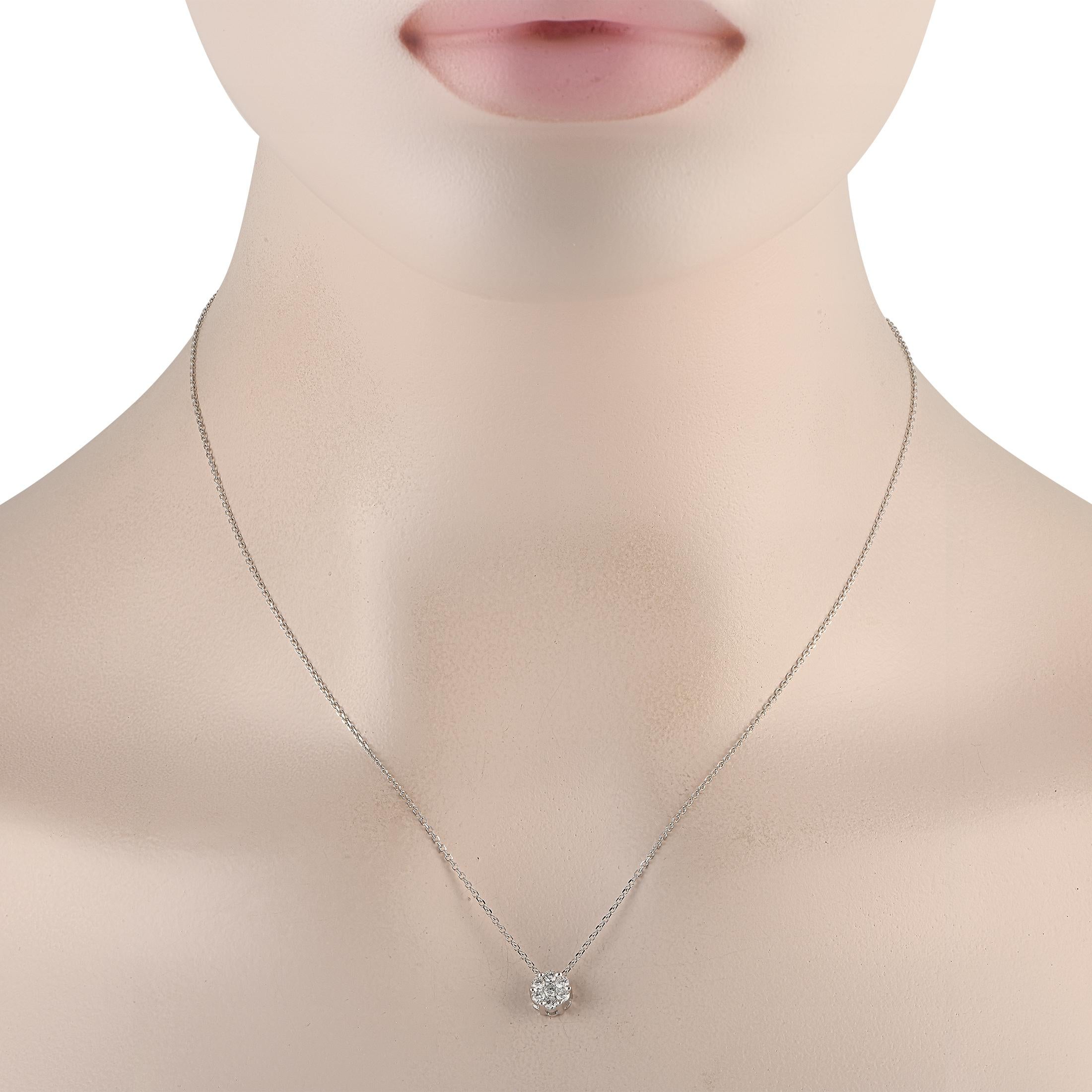 A cluster of Diamonds with a total weight of 0.40 carats add elegance to this necklaces simple, elegant 14K White Gold pendant. Crafted from 14K White Gold, the pendant measures 0.25 round and is suspended from a delicate 18 chain with secure