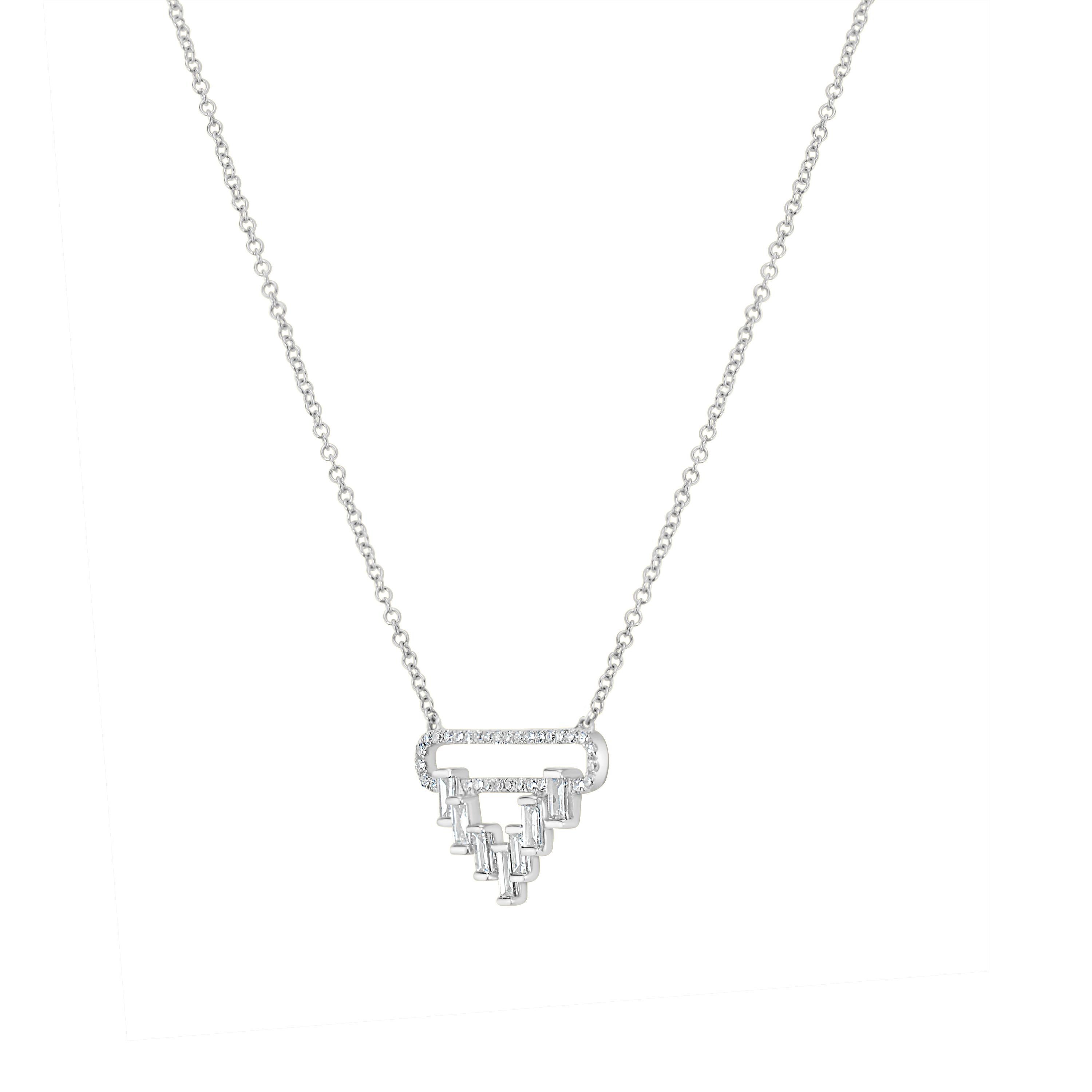 This elegant 15 inch Round and Baguette Diamond Pendant Necklace rendered in gleaming 14K white gold compliments your neckline . Embellished with 32 round diamonds and 7 baguette diamonds totaling 0.41Ct arranged in an open space triangular motif