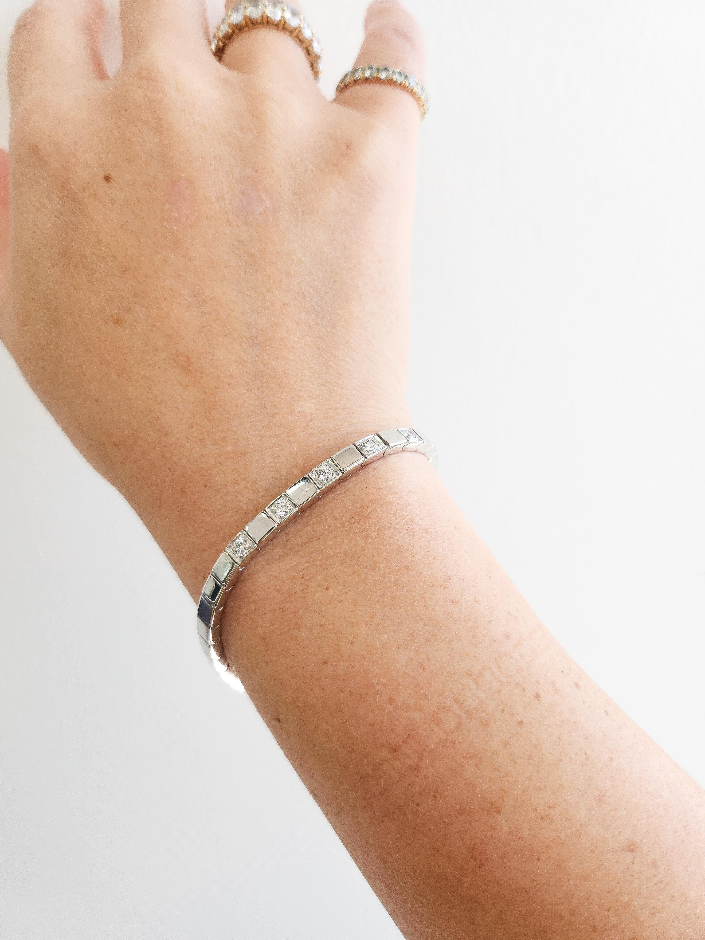 Se trata de una pulsera de oro blanco de 14 quilates con
Cinco diamantes brillantes redondos engastados en eslabones de panel cuadrado
Los diamantes pesan ~0,45 quilates
F-G VS
6,5 pulgadas de longitud
4,1 mm de ancho
16,2 gramos de oro blanco de 14