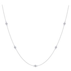 Collier en or blanc 14 carats avec lunette à diamants taille ronde de 0,50 carat au mètre