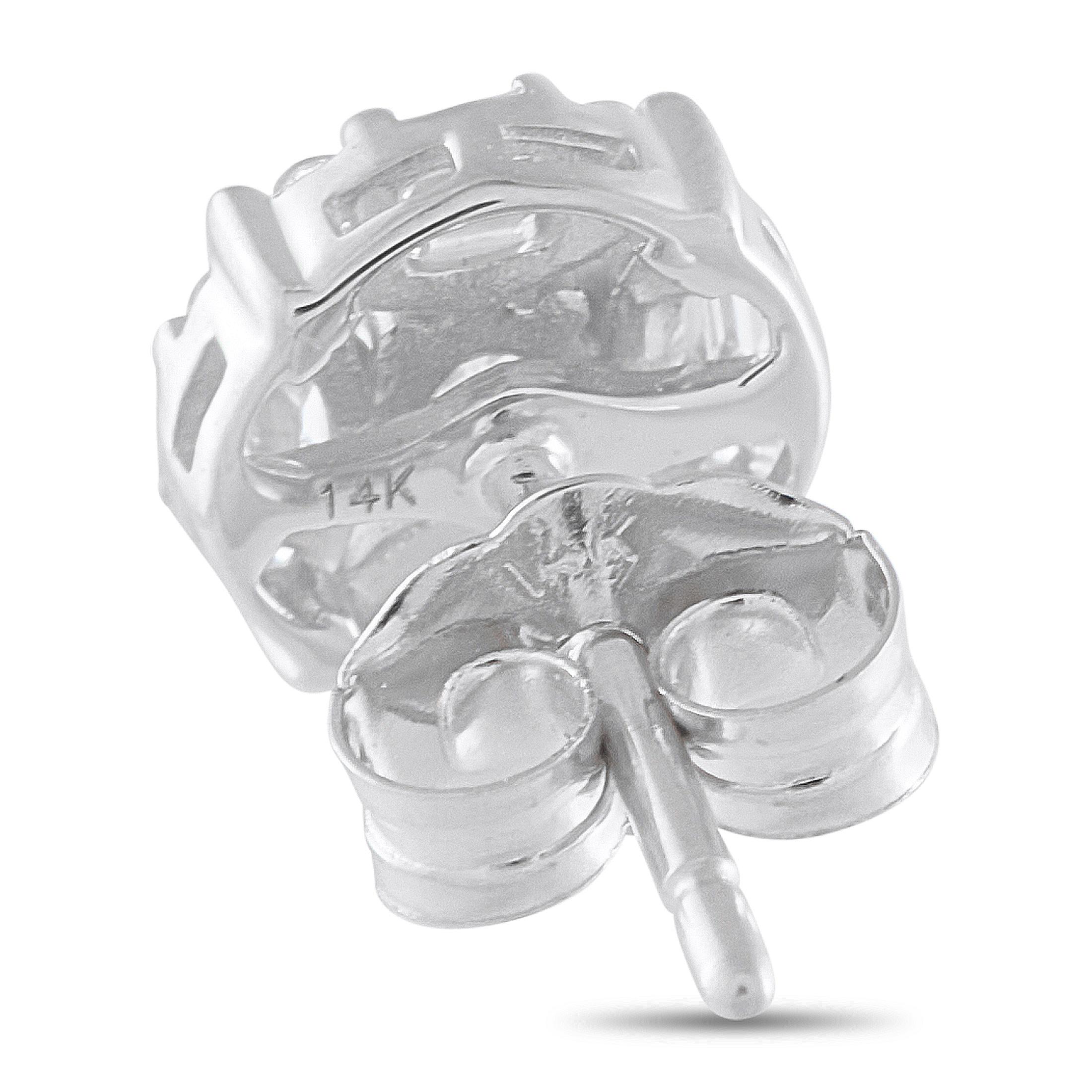 Sparkling Diamonds with a total weight of 0.50 carats make these earrings simple, elegant, and incredibly luxurious. Ideal for any occasion, each one features a 14K White Gold setting and measures 0.25 round.This jewelry piece is offered in brand