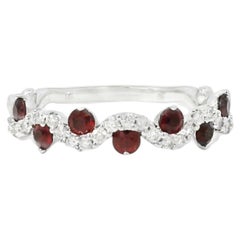14k White Gold 0.50ct Rubies and 0.20ct Round Brilliant Diamonds in a Wave Ring
