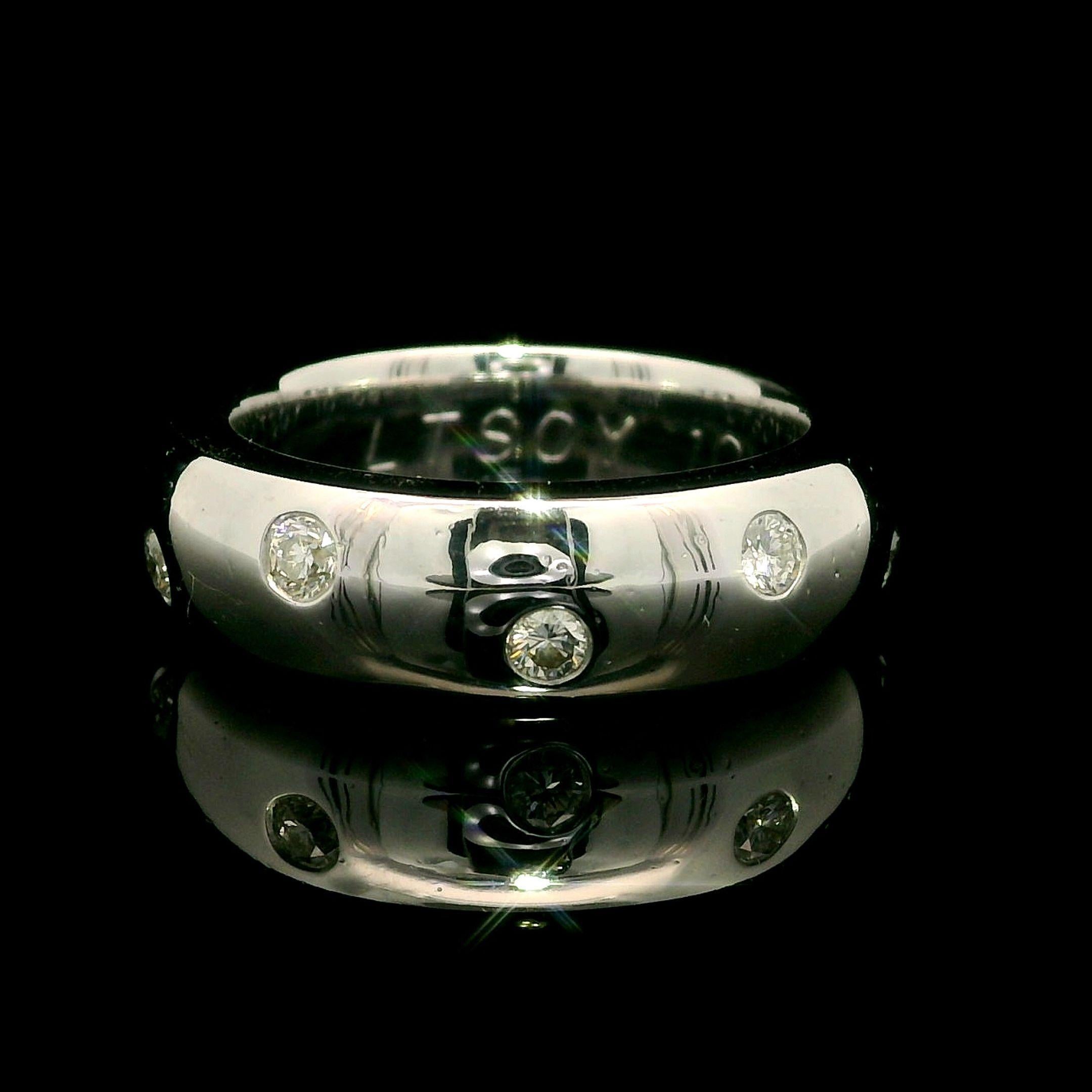 --Stone(s):--
(10) Natural Genuine Diamonds - Round Brilliant Cut - Flush /Burnish Set - G-I Color - VS-SI Clarity
Total Carat Weight: 0.50 (approx.)

Material: Solid 14k White Gold
Weight: 11.61 Grams
Ring Size: 5.5 (Fitted on a finger. We CANNOT