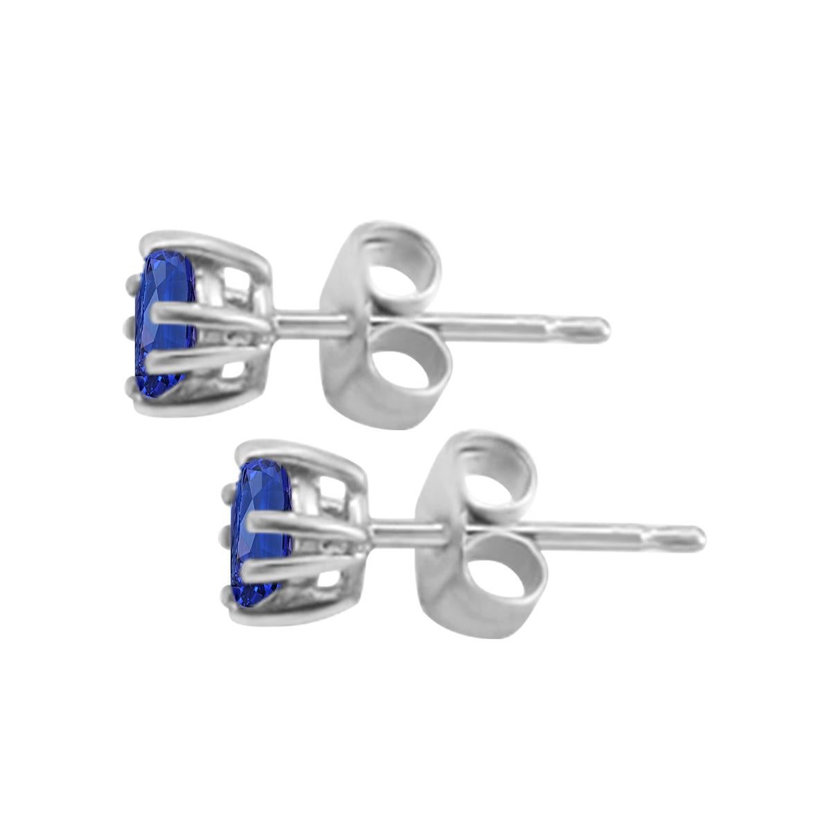 These Beautiful Stud Earrings Feature 3.5MM Princess Cut Tanzanite Gemstone For An Elegant And Chic Look.  Perfectly Settle In 14k White Gold. These Classic Earrings Are Illuminating From Afar, Accessories That Will Confidently Earn You Many
