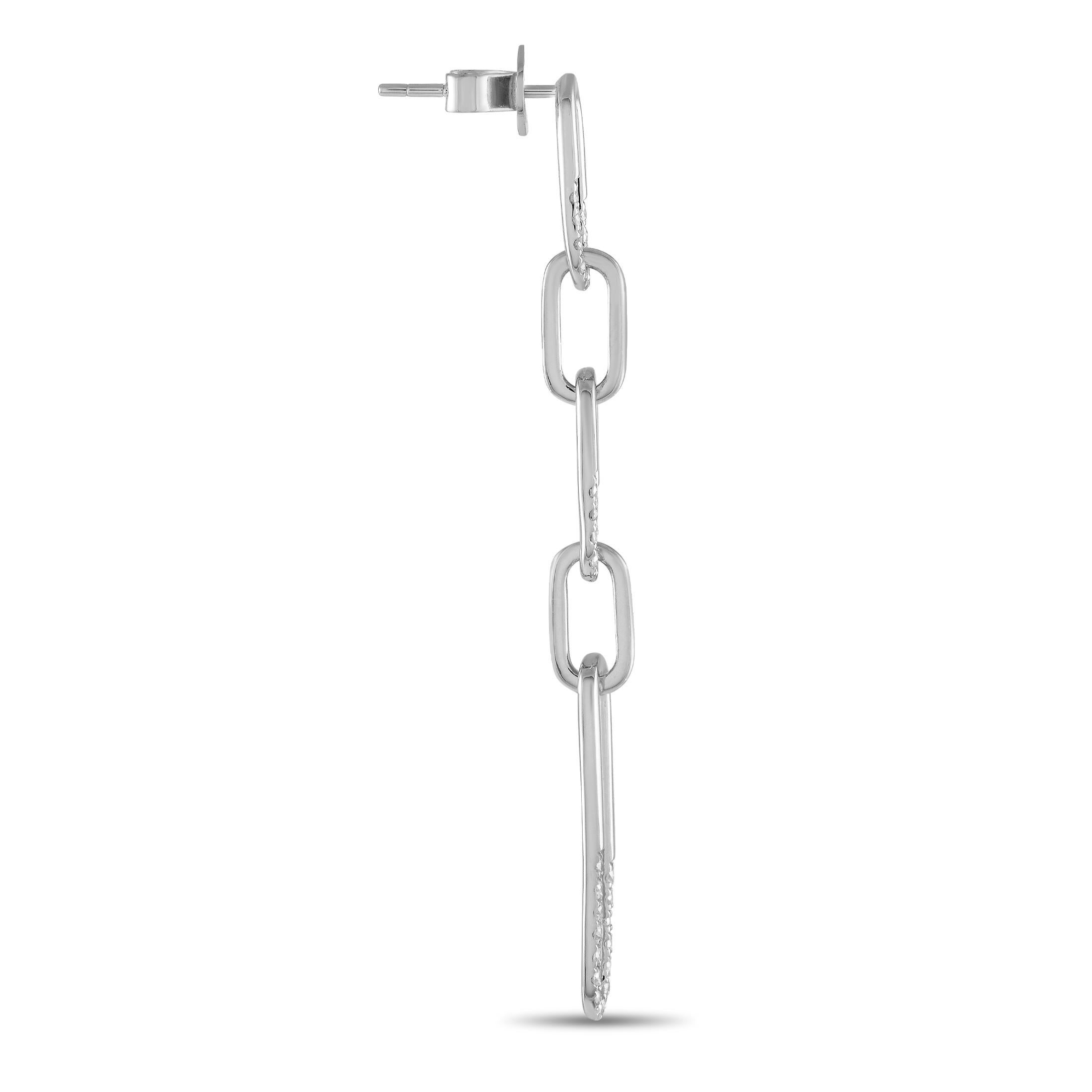 These sleek, sophisticated earrings will effortlessly accompany your every movement. Crafted from 14K white gold, they feature a series of delicate links elevated by diamond accents with a total weight of 0.55 carats. Each one measures 2.25 long by