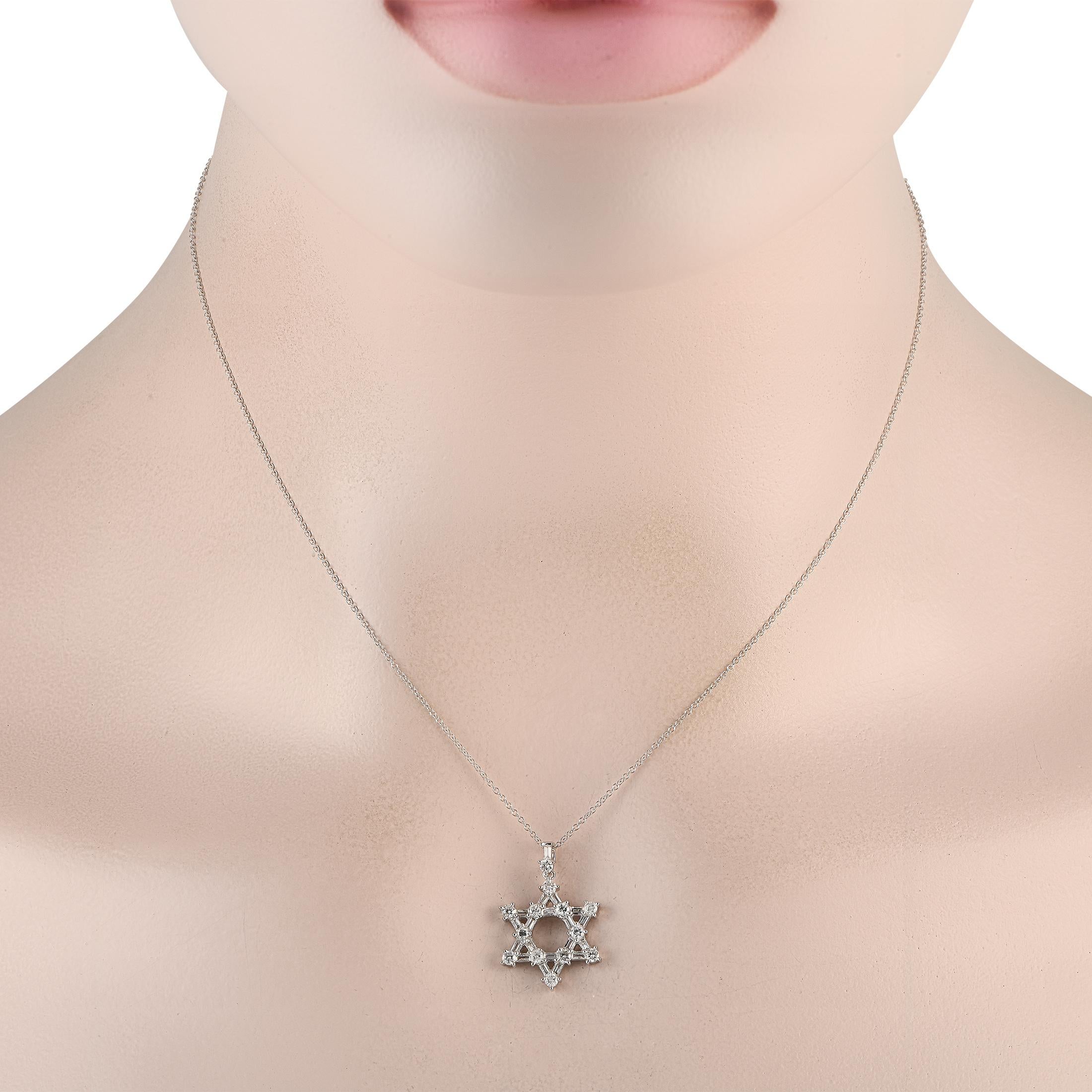 A stellar choice for an everyday diamond necklace. This piece features a thin cable chain measuring 16 inches long. It holds a six-point star pendant punctuated by 12 round diamonds, each on a four-prong setting. The bail is also dotted with a