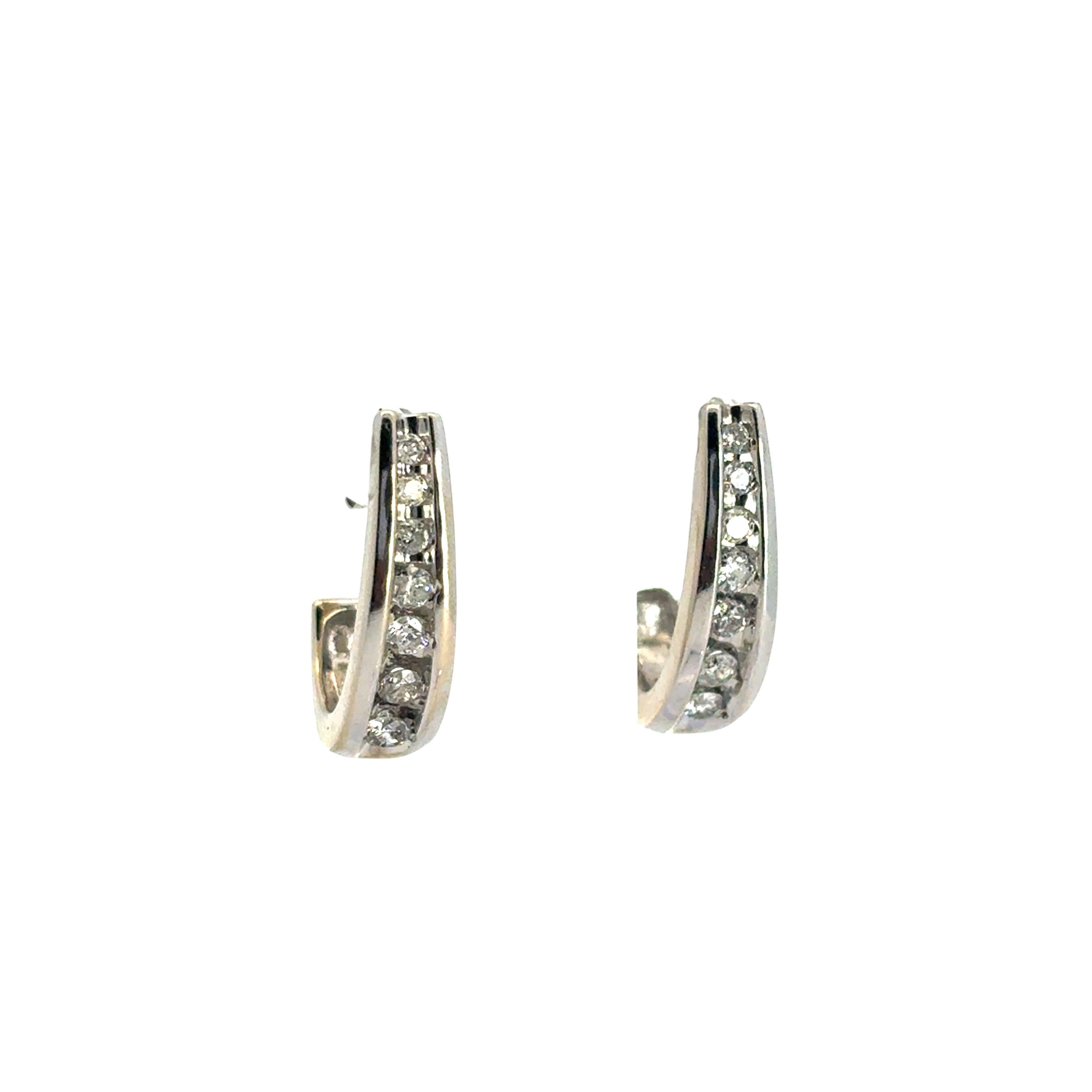 14k White Gold 0.57ctw Channel Set Diamond Hoops

This stunning Gold 0.57ctw Diamond Hoops is in excellent condition and is ready to ship!

Earring Type: Hoop Earrings
Material: 14k White Gold
Diamond Details: These earrings feature seven diamonds