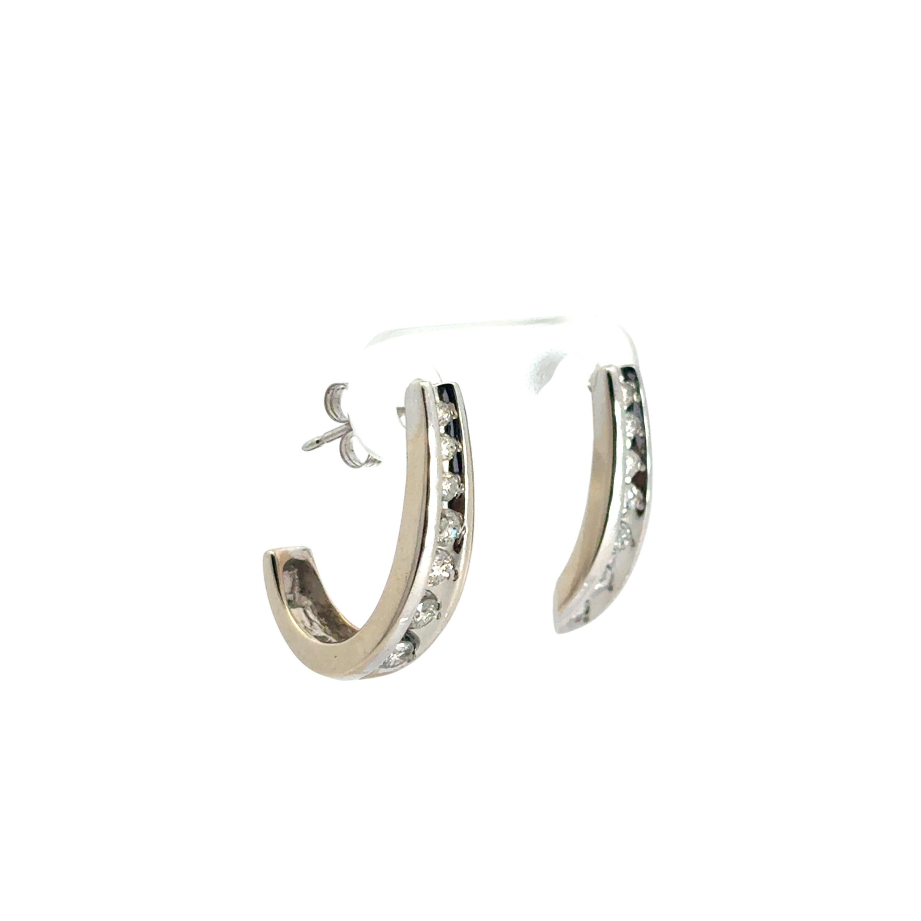 Contemporary 14k White Gold 0.57ctw Channel Set Diamond Hoops For Sale