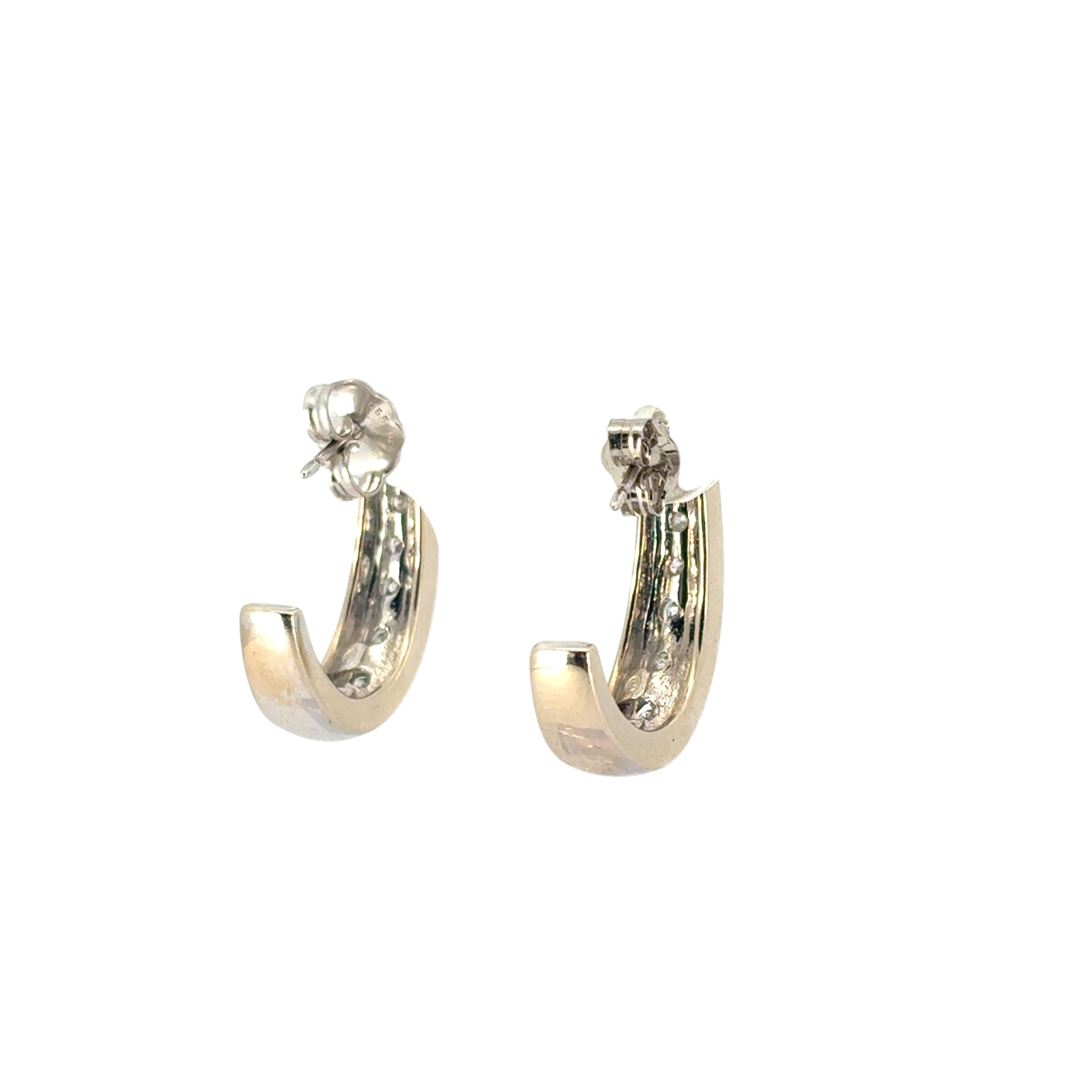 14k White Gold 0.57ctw Channel Set Diamond Hoops In Excellent Condition For Sale In Boca Raton, FL