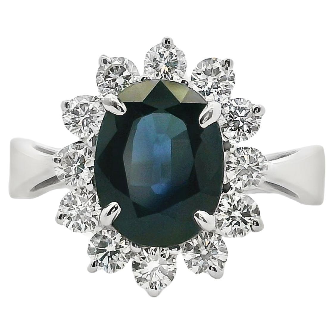 Bague en or blanc 14 carats avec saphir ovale de 0,60 carat et diamant naturel de 0,40 carat