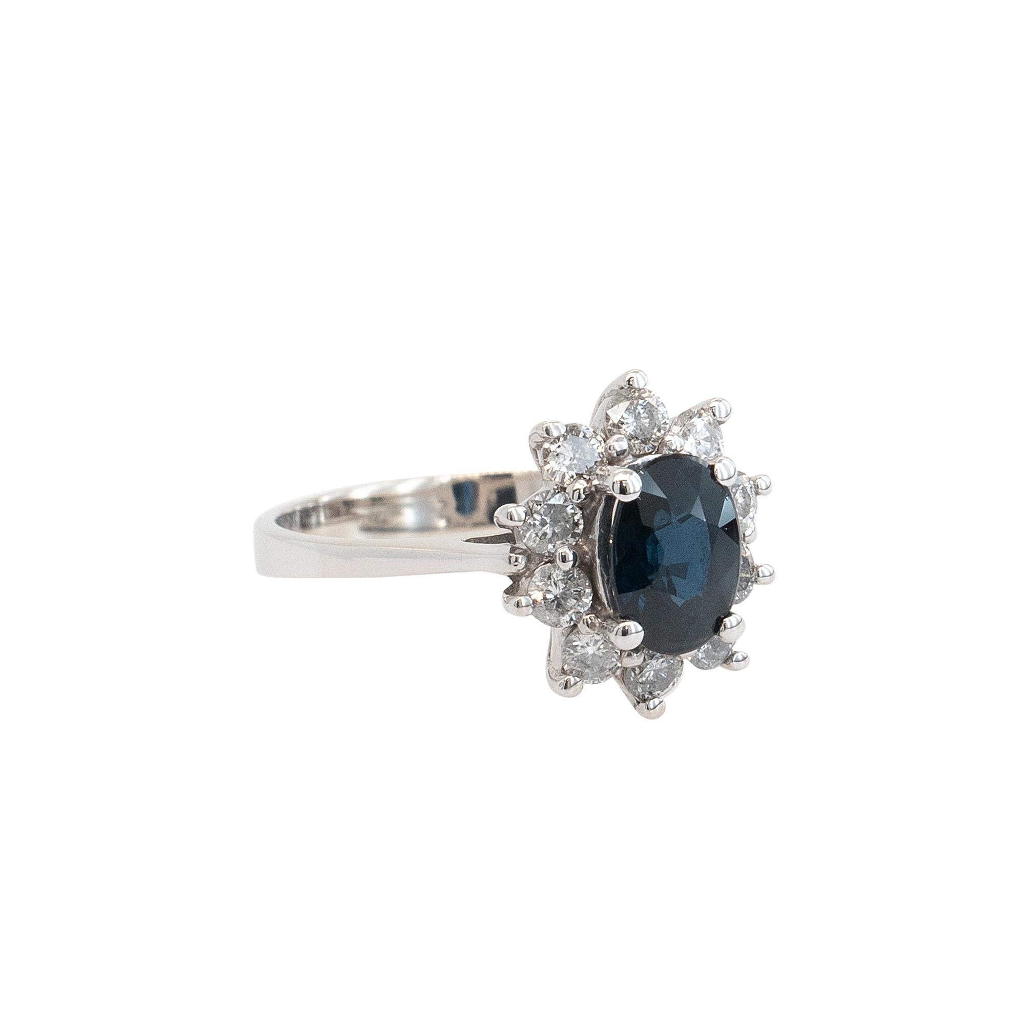 Center Details: 0.60ctw Oval Sapphire
Ring Material: 	
14k White Gold
0.40ctw Natural Round Brilliant Cut Diamonds (10 Diamonds)
Diamonds are G/H color and SI clarity
19mm x 24mm
Ring Size: 5.75 (can be sized)
Total Weight: 3.9g (2.5dwt)
This item