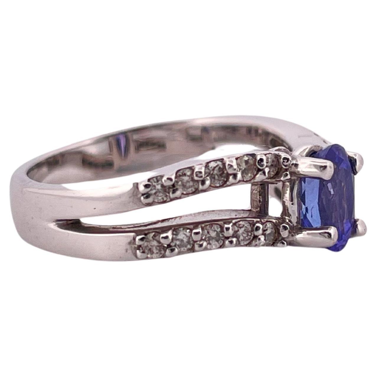 Anillo de oro blanco de 14 quilates con tanzanita de 0,60 quilates y diamante H-I SI1 de 0,40 quilates Corte redondo en venta