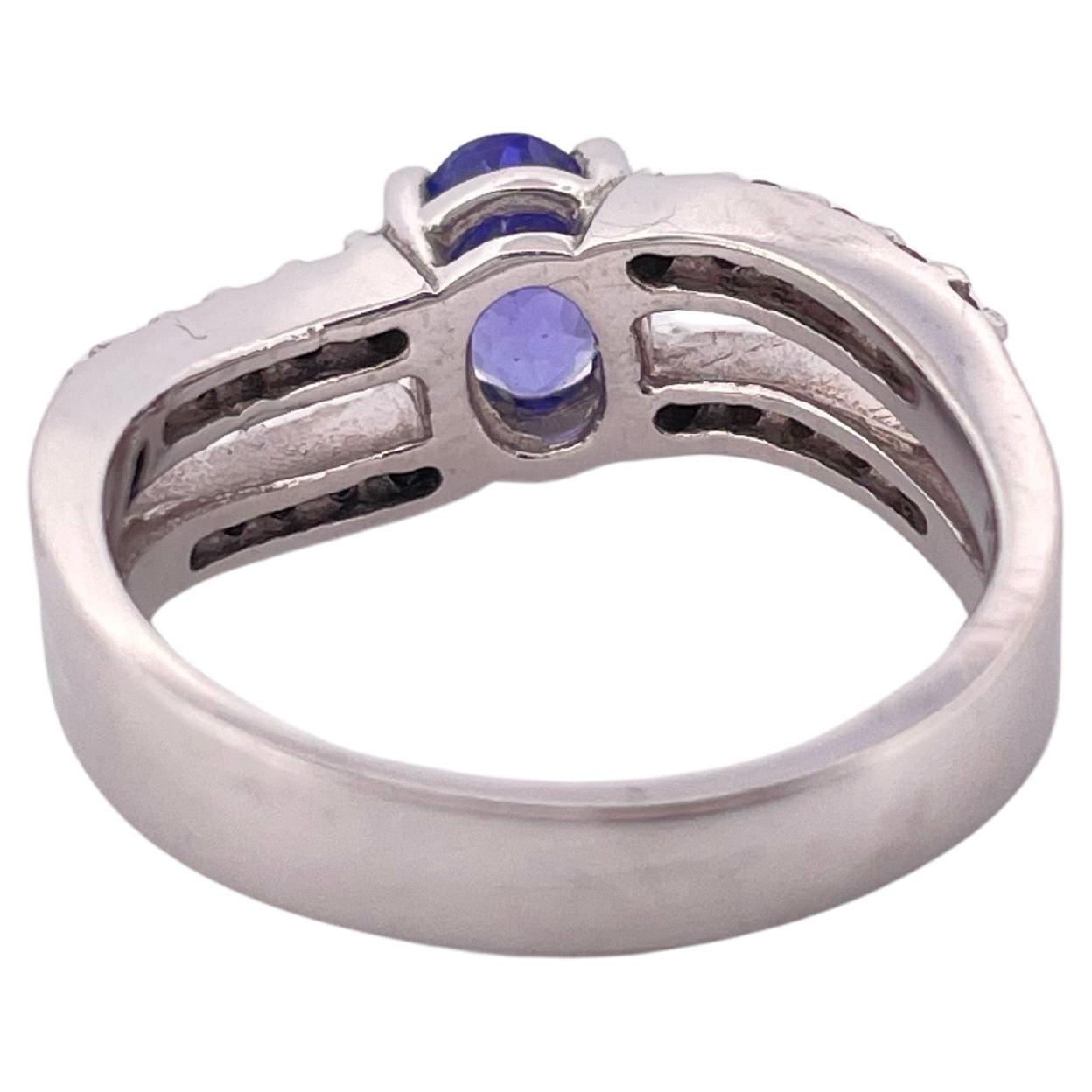 Femenino o masculino Anillo de oro blanco de 14 quilates con tanzanita de 0,60 quilates y diamante H-I SI1 de 0,40 quilates en venta