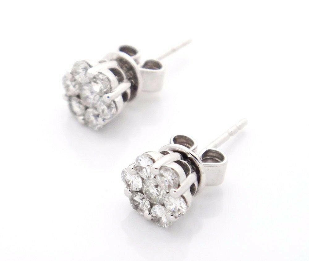 14k White Gold 0.62tcw Flower Cluster Diamond Stud Earrings
Dimensions: 15mm by 5.5mm
Metal: 14k white gold
Clarity: Si1-Si2
Color: G-H
TCW: 0.62
Stone:  Diamonds,
Stone Shape: Rounds 
Weight: 1.6g