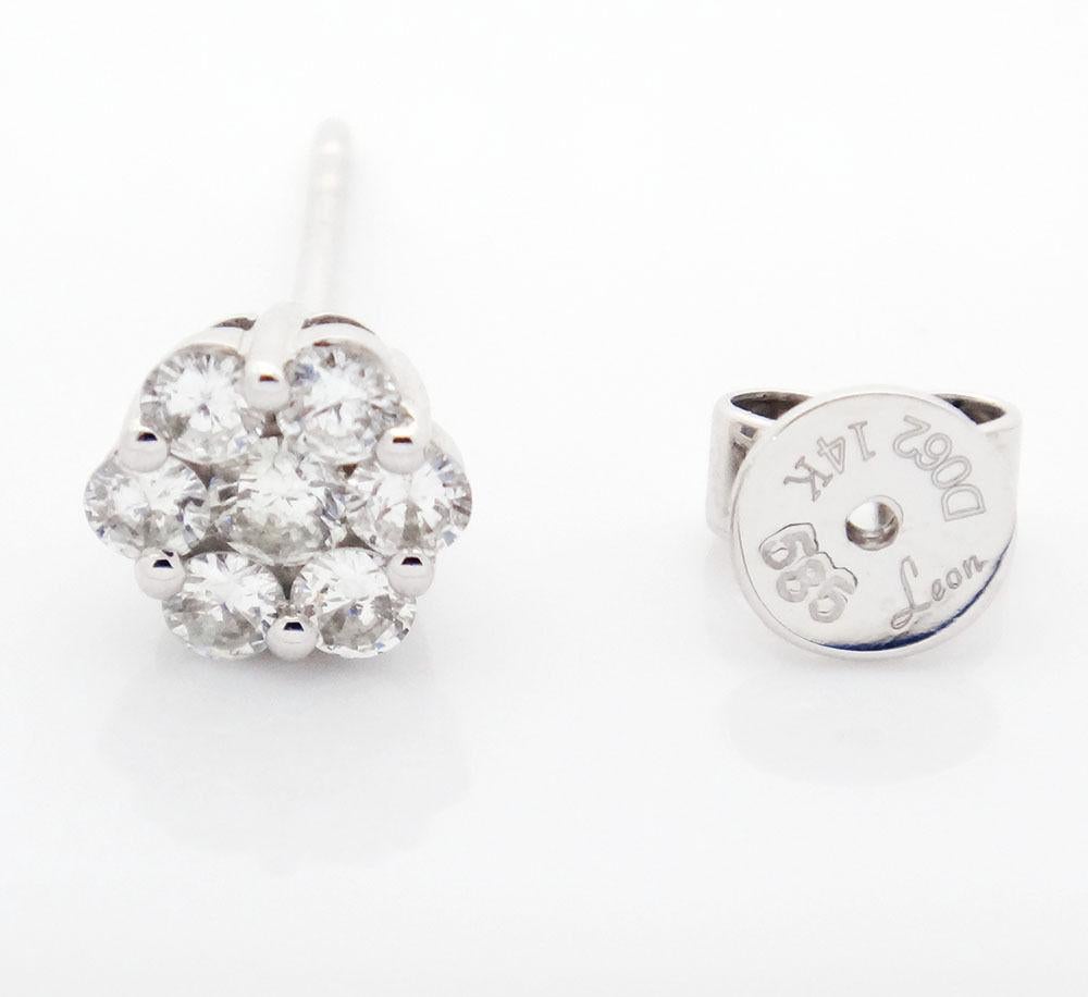 Women's 14 Karat White Gold 0.62 Carat Flower Cluster Diamond Stud Earrings For Sale
