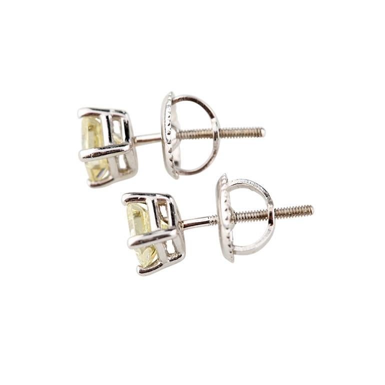 Women's 14k White Gold 0.64 Carat Princess Cut Diamond Solitaire Stud Earrings For Sale