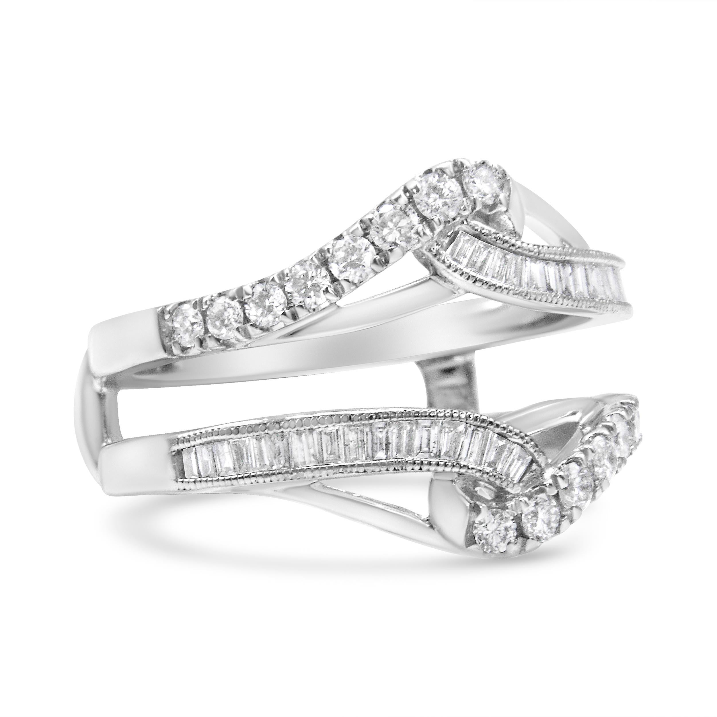 This sparkling ring enhancer is a piece that will instantly elevate her bridal or diamond solitaire ring. The look displays a top and bottom row of round diamonds in prong settings, offset by complementing rows of baguette diamonds in an invisible