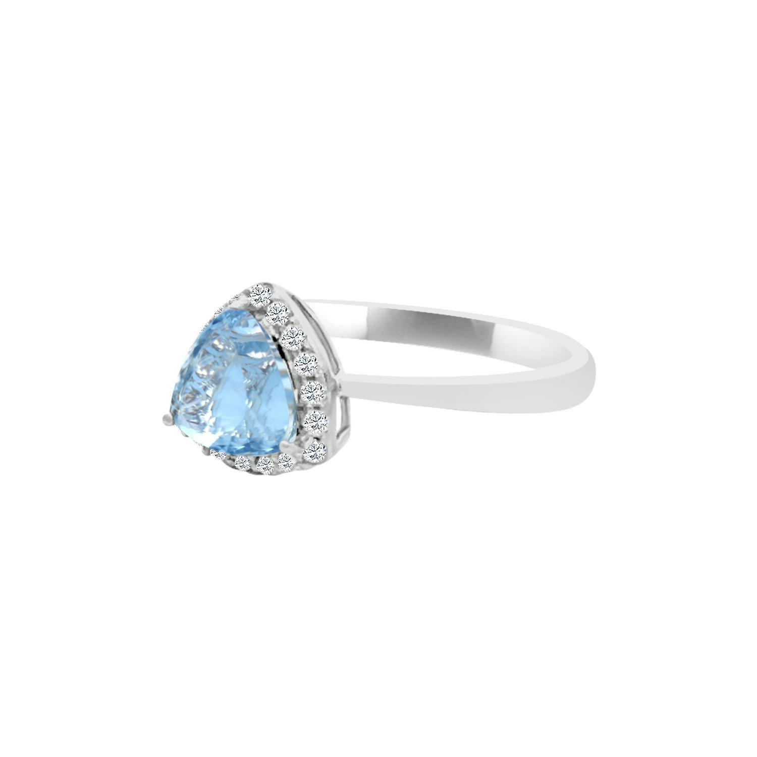 Highlight Your Fine Taste Of Jewelry With The Combination Of Centre Trillion Shape Aquamarine With Diamond Embellishment Which Is Sure To Get You Compliments. 
This Beautiful 6mm Aquamarine Ring Is Made In 14k White Gold. This Mesmerizing Ring Is