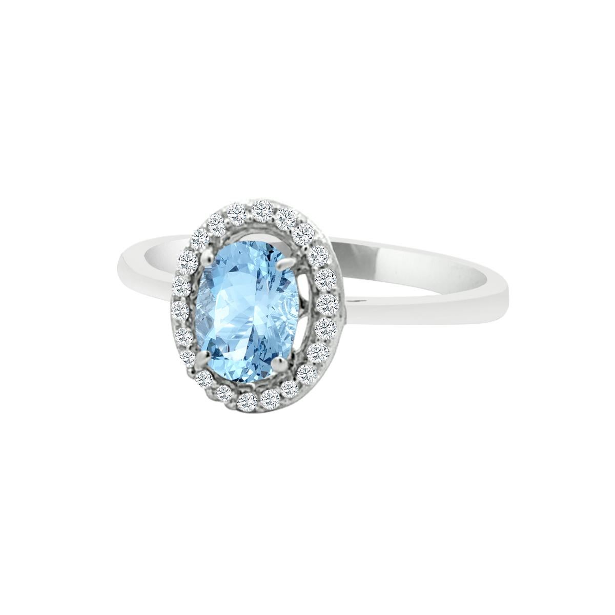This Stunning Aquamarine And Diamond Engagement Ring Will Sweep Her Off Her Feet.
Bright And Beautiful 7x5mm Oval Shape Center Stone Is Eye Clear With Round Diamonds Surrounding It,
And A Simple 14k White Gold Band Looks Perfect In This Ring.
This