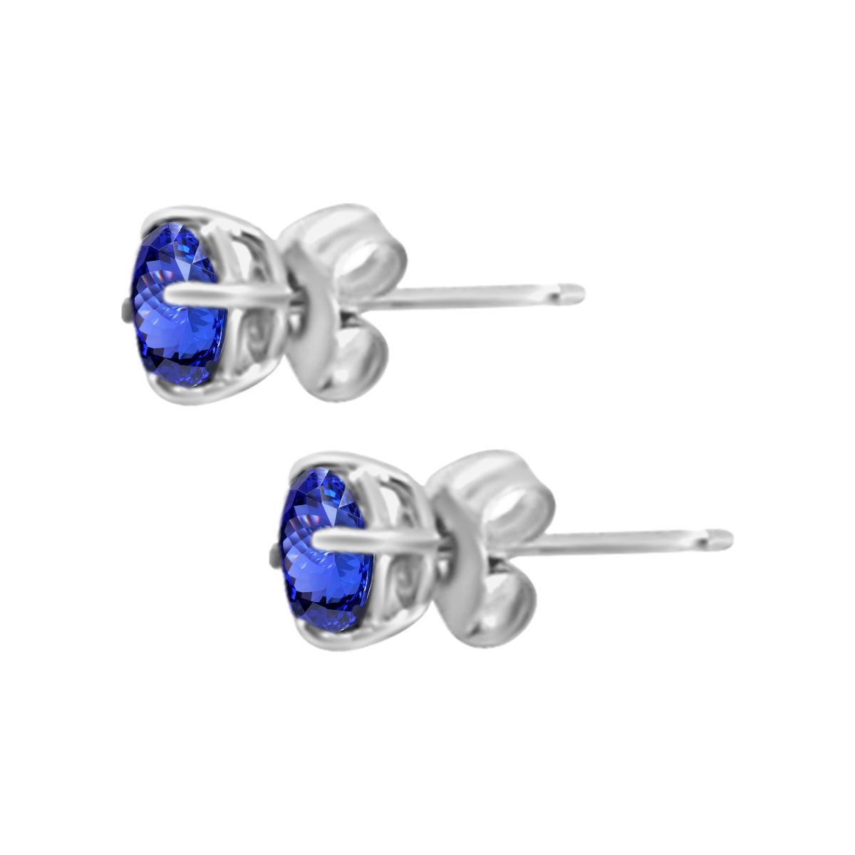 Add A Twist  To Your Tanzanite Collection With These Beautiful Studs. 
This Beautiful Pair Features Perfect Round 4.5MM Tanzanite Gemstone Perfectly Set In 14K White Gold.
So Finish Your Look With These Lovely Pair Of Tanzanite Stud Earrings From