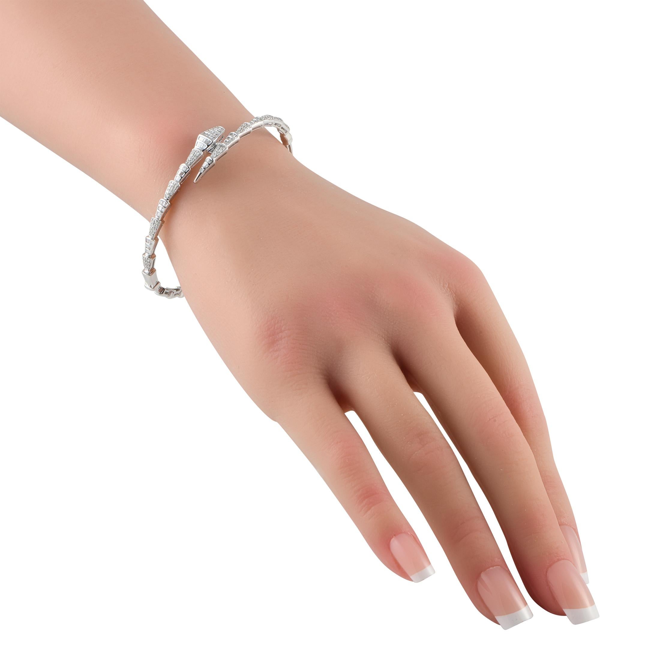 A stylish serpentine shape makes this luxury bracelet an elegant addition to any ensemble. This pieces 14K white gold links shine to life thanks to a stunning array of inset diamonds, which together possess a total weight of 0.75 carats. It measures