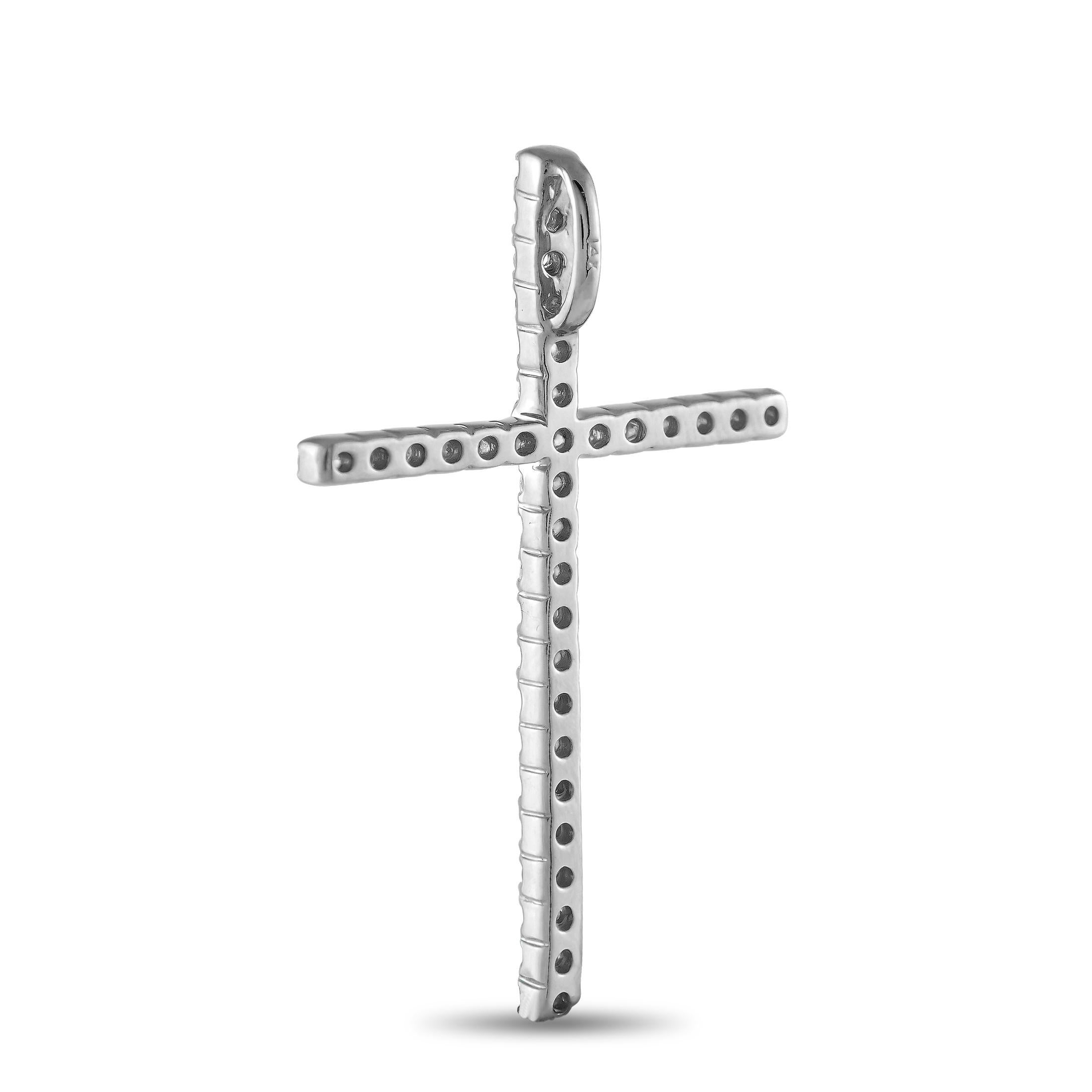 Zeigen Sie Ihren Glauben auf brillante Weise mit dieser diamantenen Kreuz-Halskette. Dieses funkelnde Symbol des Glaubens besteht aus einem 1,5 x 1,0 schlanken Kreuzanhänger, der von runden Diamanten auf gemeinsamen Zacken durchzogen ist. Dieser