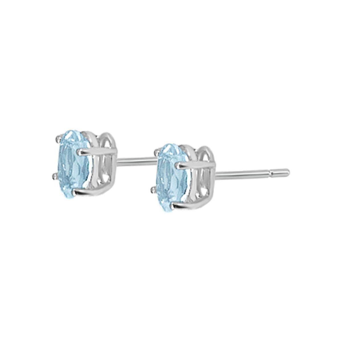 The Shape Of Elegance.
These Oval Shaped Aquamarine Stud Earring Are Designed In 14K White Gold. The Icy Blue 6x4mm Aquamarine Are Prong Set And Draw The Eye With Their Irresistible Radiance.

Style# TS1323AQE
Aquamarine: Oval 6x4mm 0.77cts