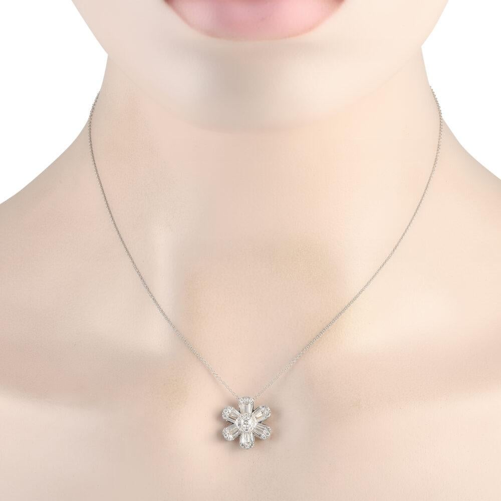 A stunning floral-shaped pendant measuring 0.65 round makes this necklace instantly captivating. Diamonds with a total weight of 1.20 carats also allow it to sparkle and shine every time it catches the light. Crafted from opulent 14K White Gold, it