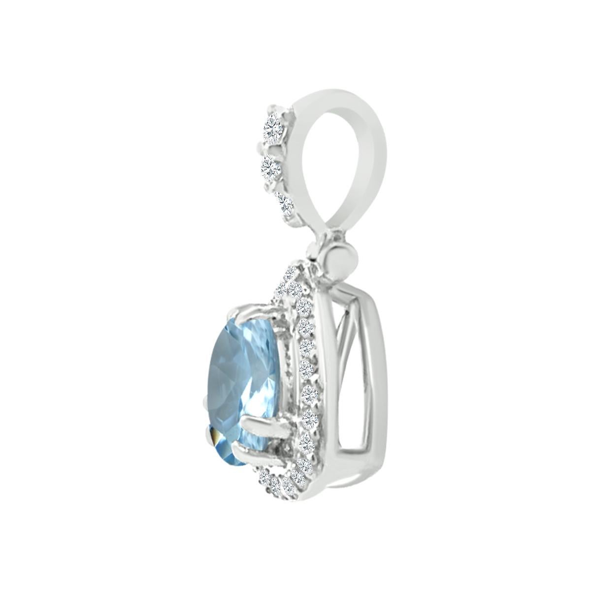 A Shimmering Statement In A Lovely Blue Hue, This Gemstone And Diamond Pendant Feature A Light Blue 6mm Round Cut Gemstone Along With Round Diamonds Creating A Wall Of Brilliance And Fire In A Pave Setting Further Enhancing The Stunning Shape Of The