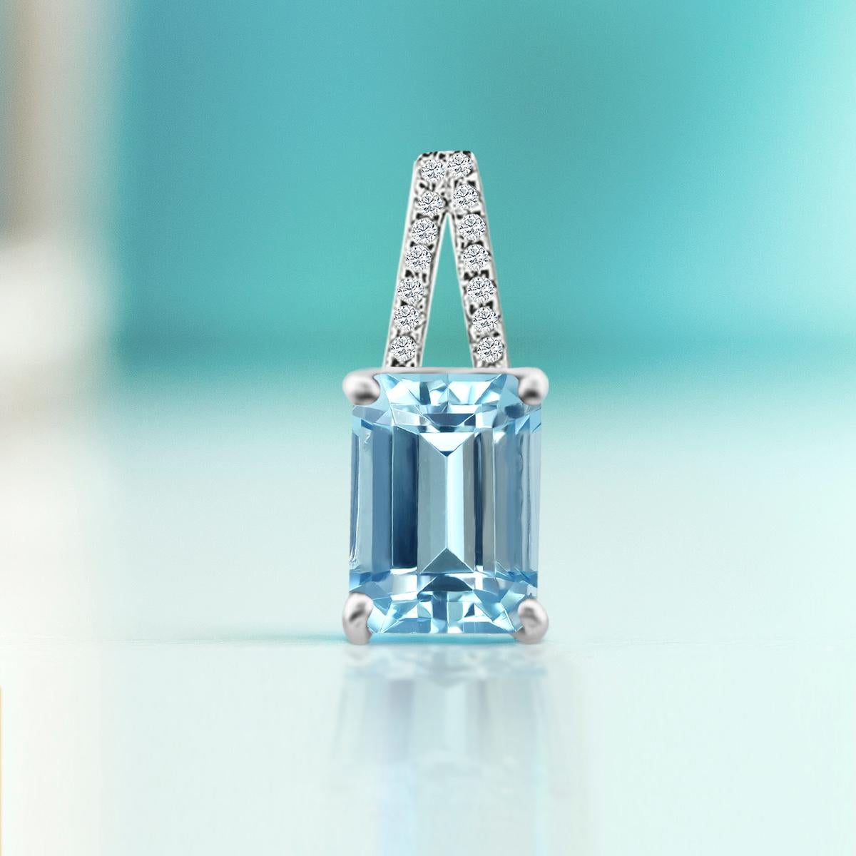 Softly Sparkle With The Icy-Blue Beauty Of This Octagon Cut 7x5mm Aquamarine Gemstone Pendant, Designed And Nestled In An Elegant Frame Of Round Diamonds.
This Elegant Piece Is Crafted In 14K White Gold.
The Stone Has A Gorgeous Light Blue Color