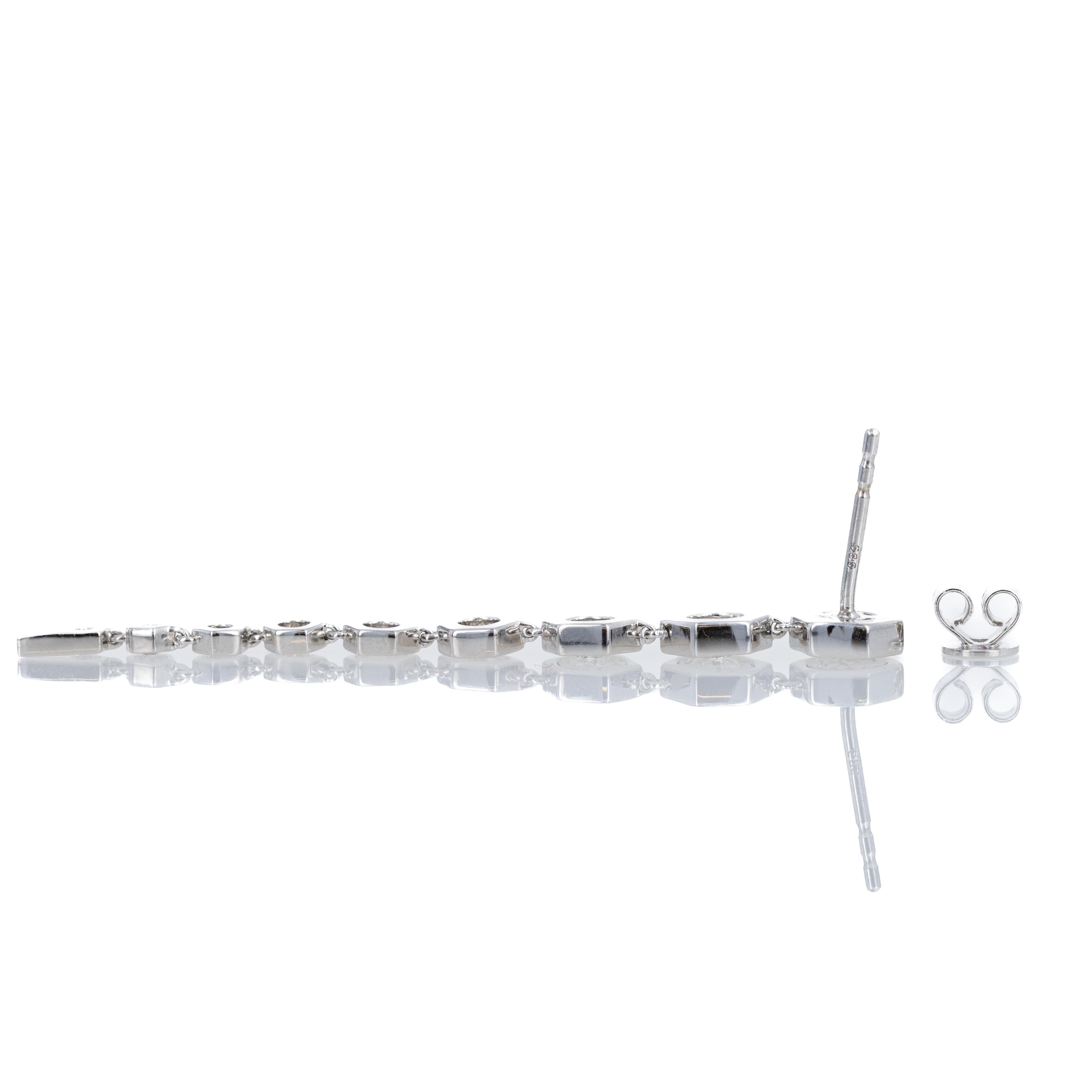 Era: New

Composition: 14K White Gold

Primary Stones: Round Brilliant Diamonds

Carat Weight: 0.85 Carats In Total

Color/Clarity: G-H / SI1-2

Earring Weight: 5.6 Grams

Earring Dimensions: 2