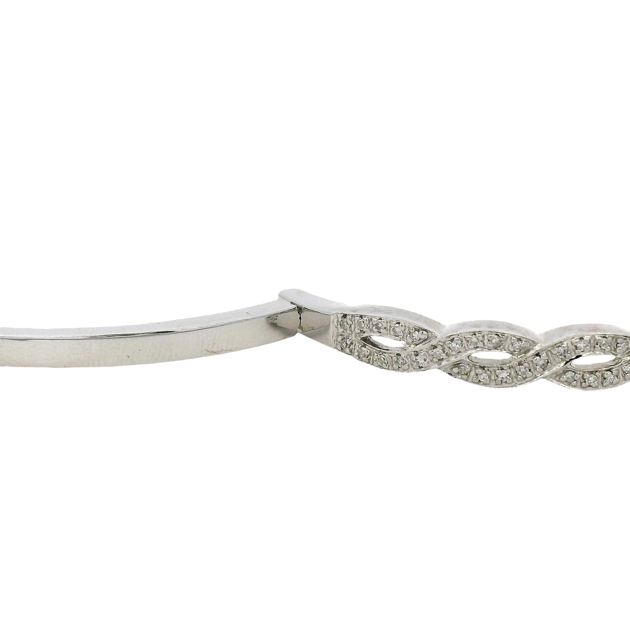 14k White Gold 0.85ctw Twisted Style Diamond Bangle For Sale 4