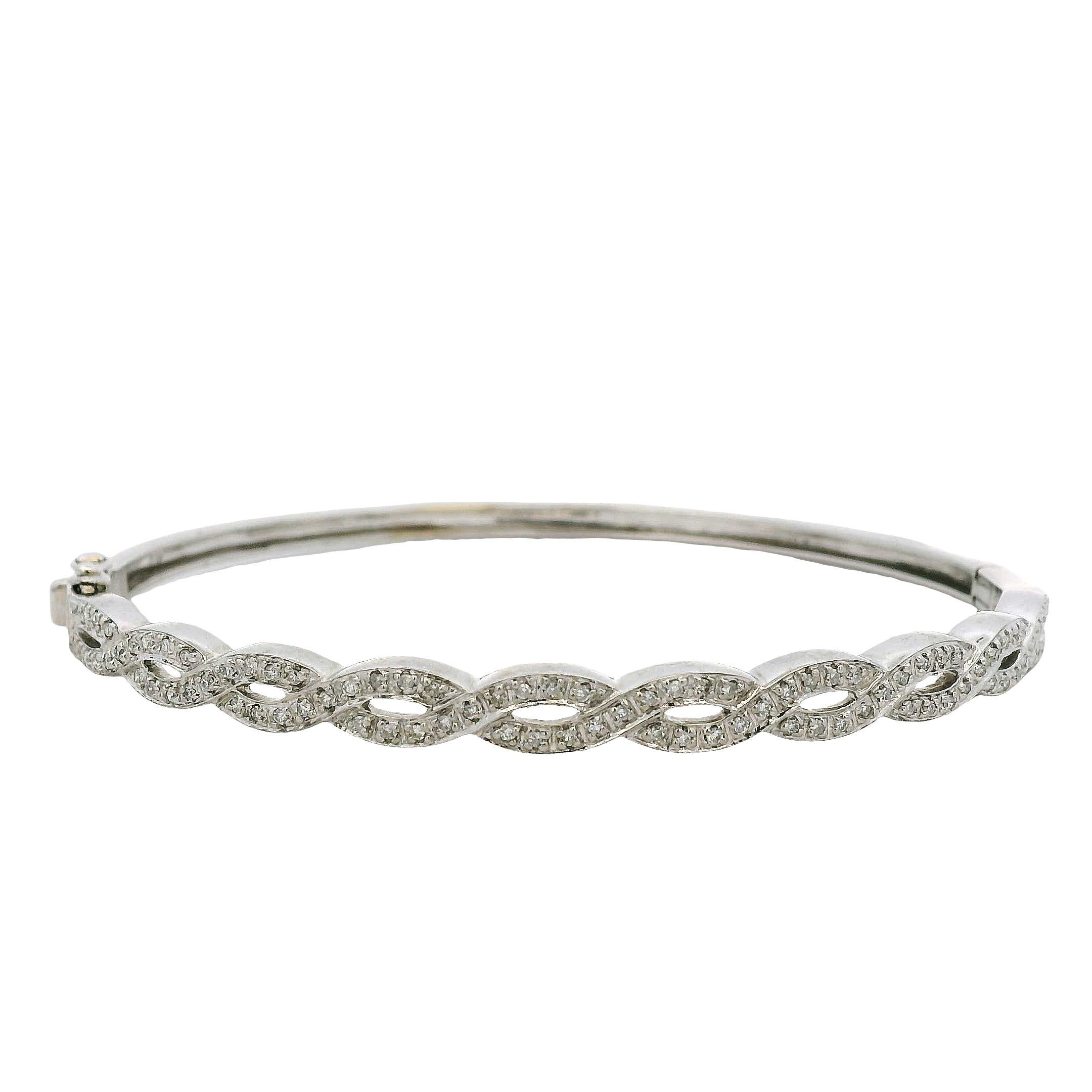 14k White Gold 0.85ctw Twisted Style Diamond Bangle

This vibrant 0.85ctw Twisted Diamond Bangle is in excellent condition and ready to ship!

Type: Bangle Bracelet
Style: Twisted Style
Material: 14k White Gold
Diamond Details: This bangle features