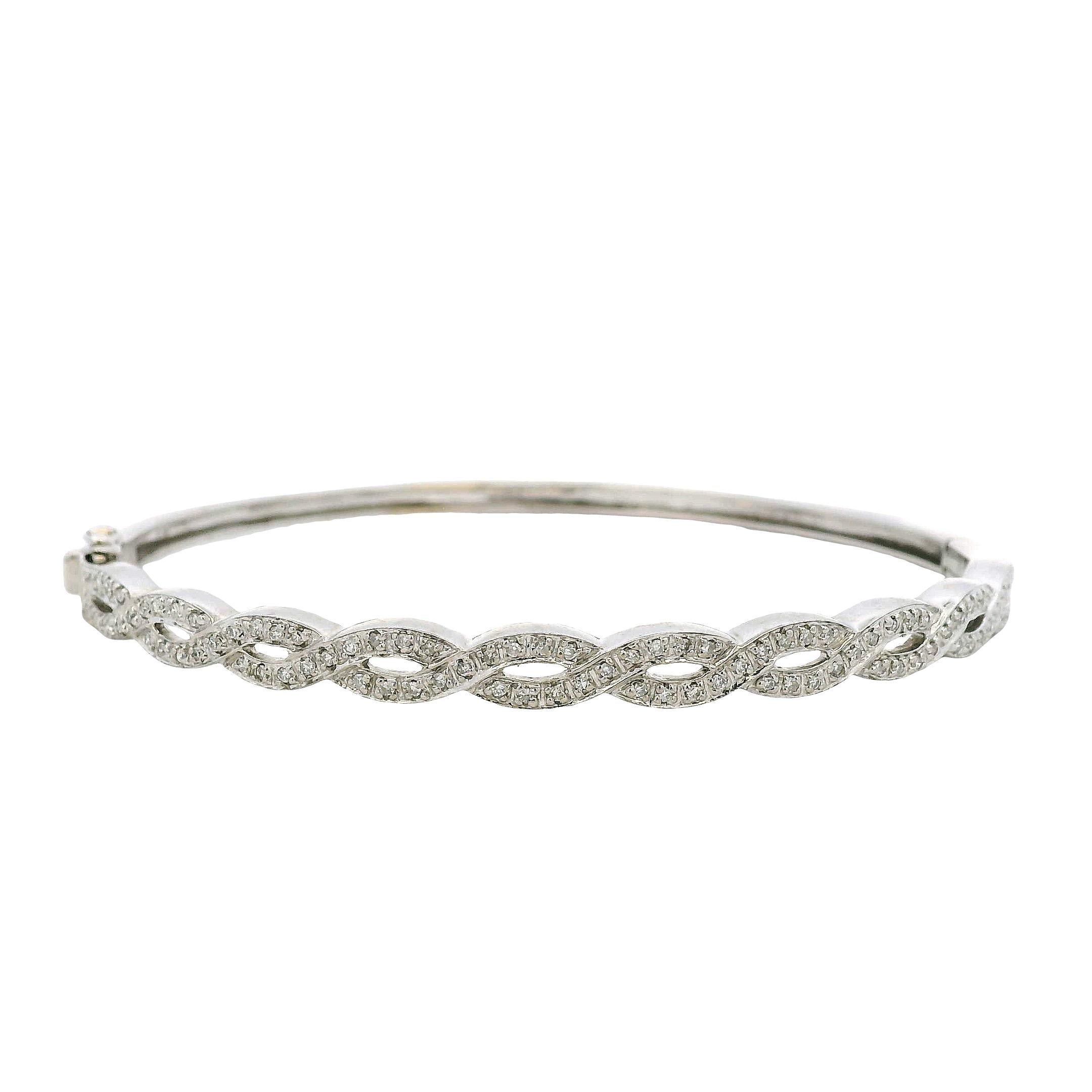 Modern 14k White Gold 0.85ctw Twisted Style Diamond Bangle For Sale
