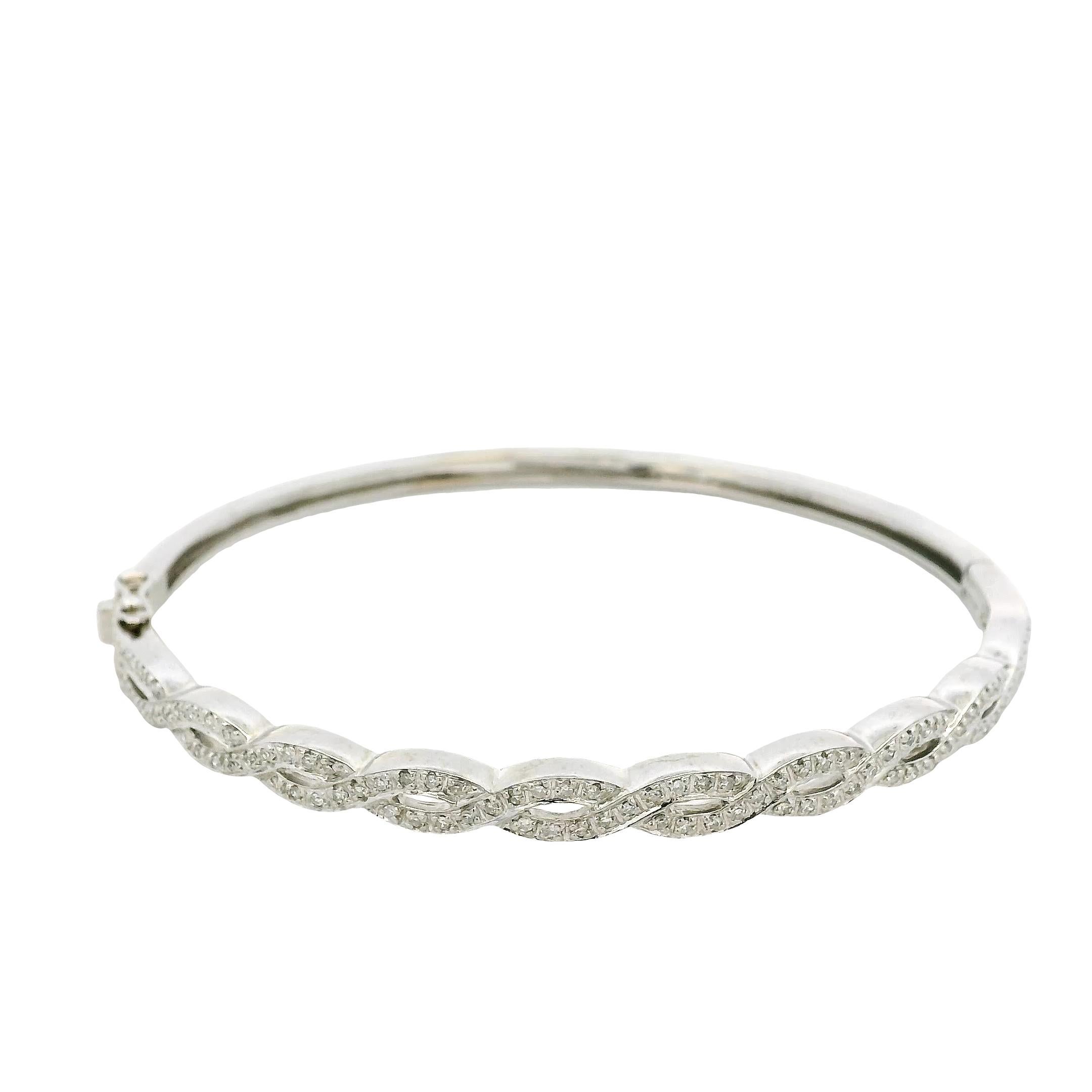 Round Cut 14k White Gold 0.85ctw Twisted Style Diamond Bangle For Sale