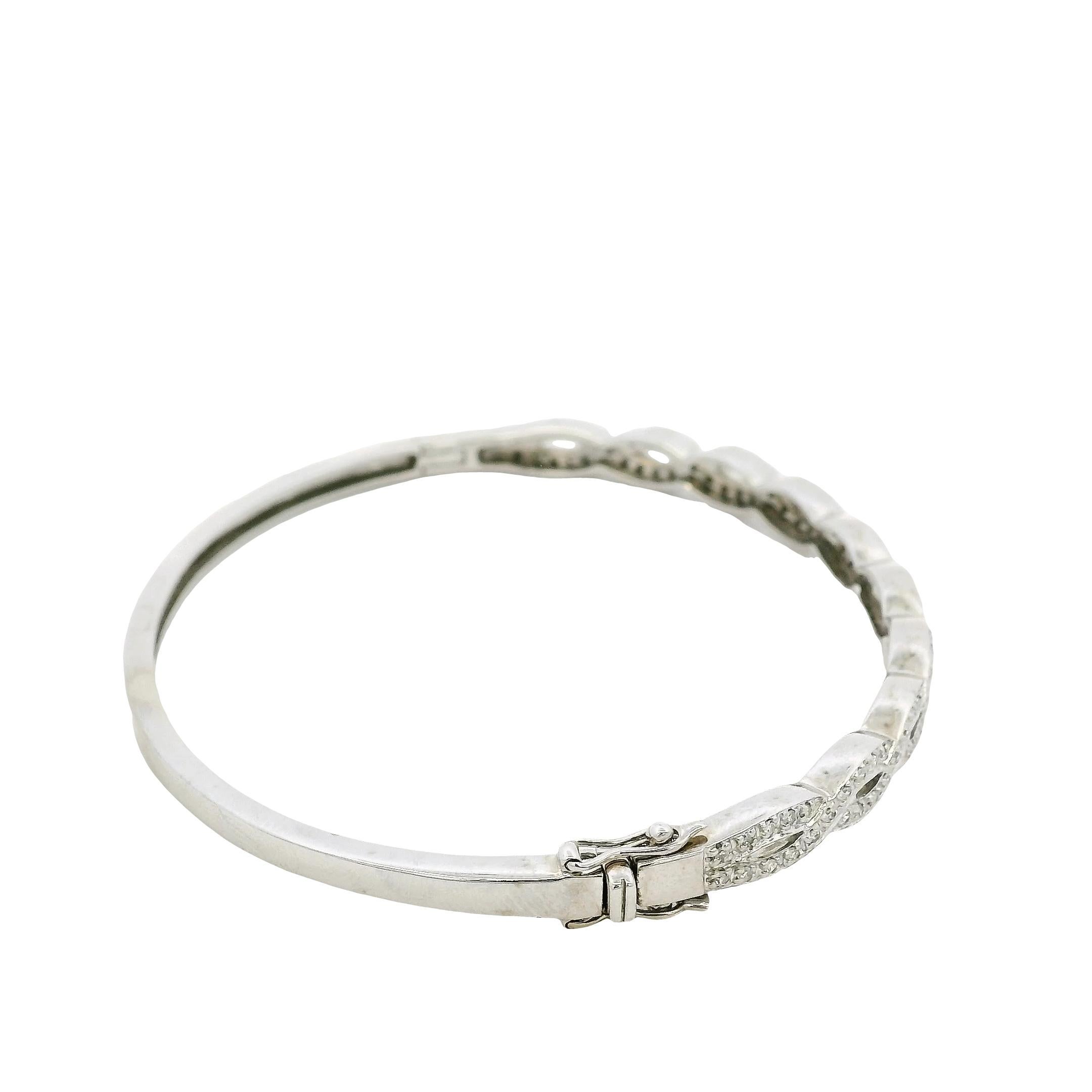 Women's 14k White Gold 0.85ctw Twisted Style Diamond Bangle For Sale