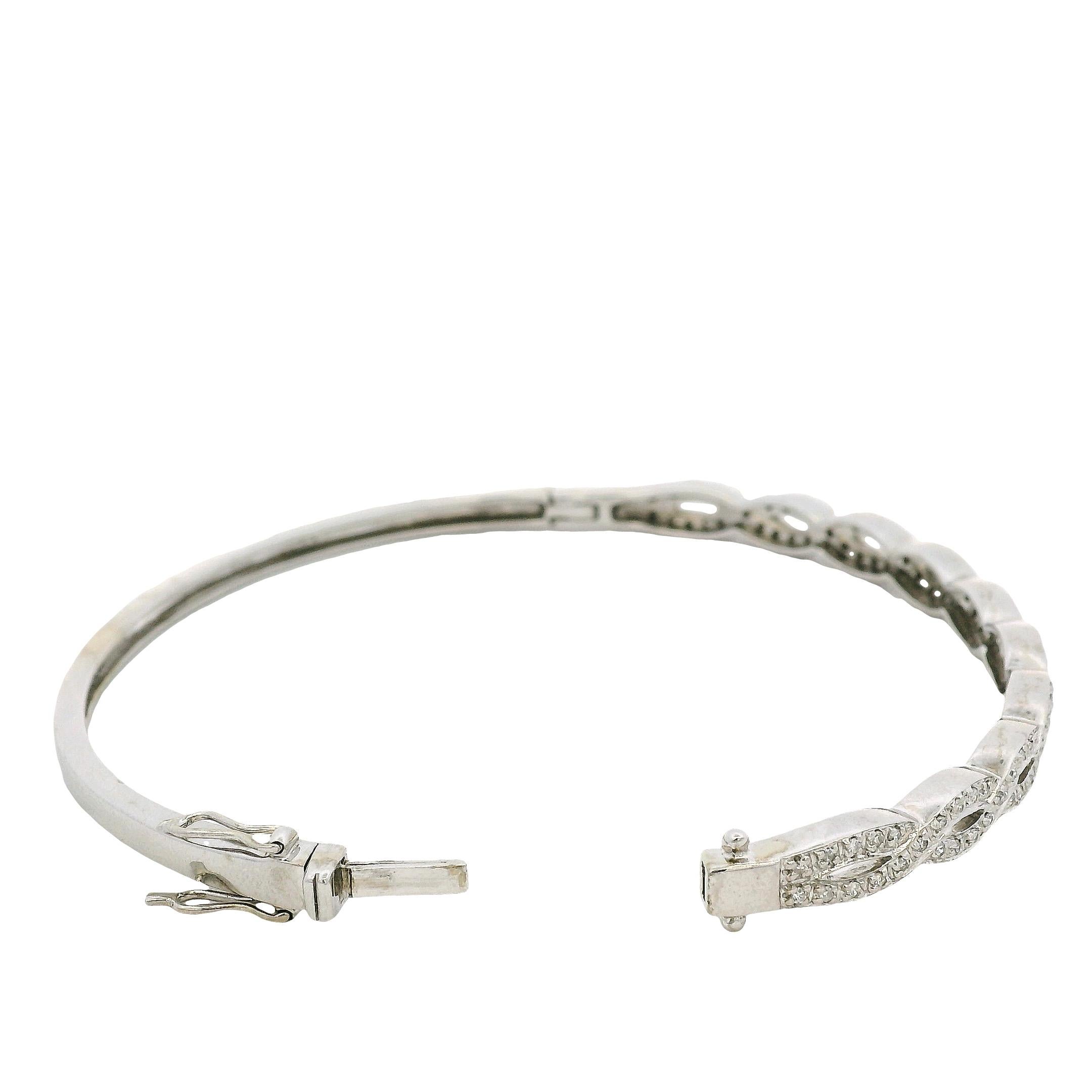 14k White Gold 0.85ctw Twisted Style Diamond Bangle For Sale 3