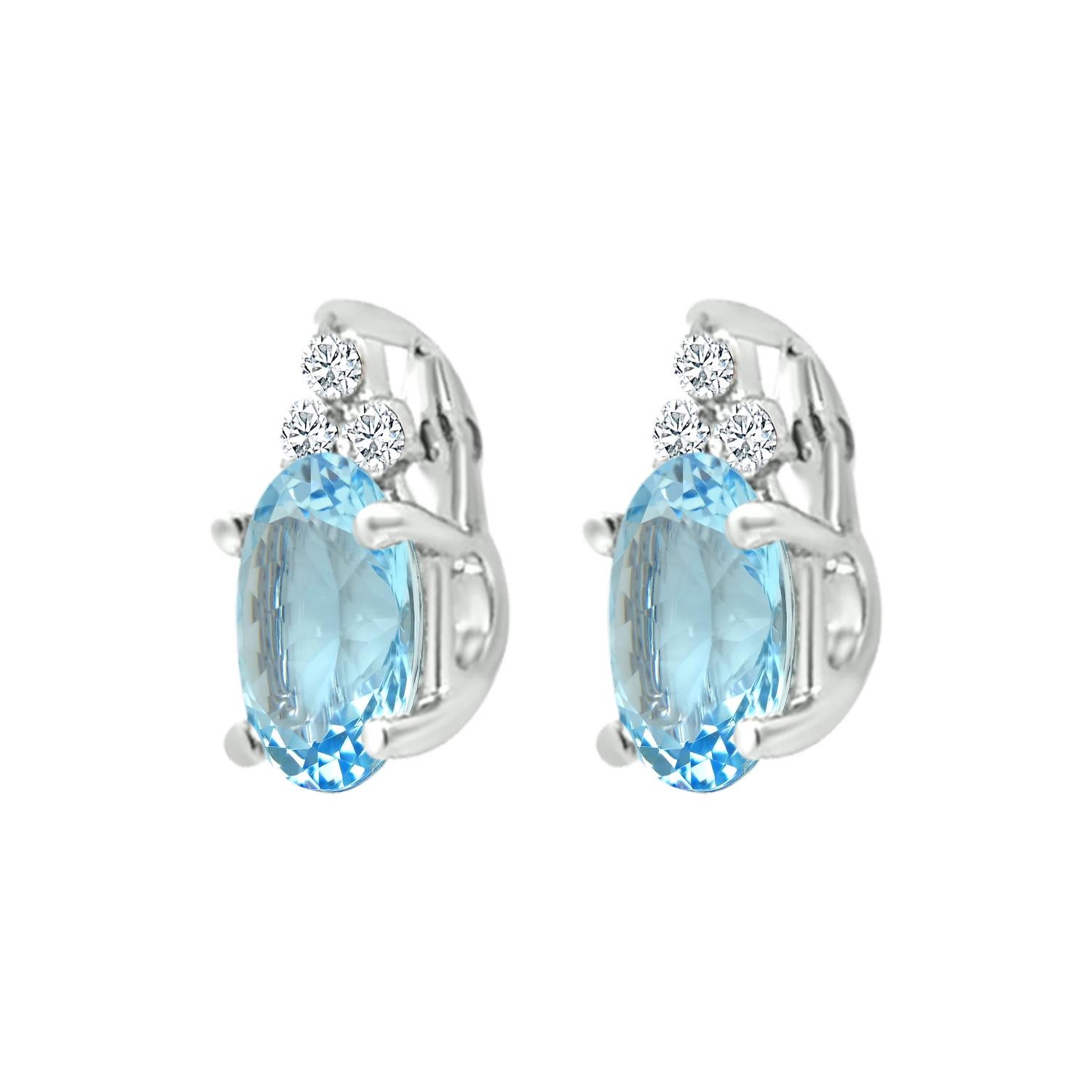 Aquamarine Is The Traditional March Birthstone And Aquamarine Stone Earrings Are Simply Stunning.
These Classic And Stylish Earrings Features Serene Blue 6x4mm Aquamarine Gemstone Secured In a Classic Four Prong Basket Setting With Beautiful Diamond