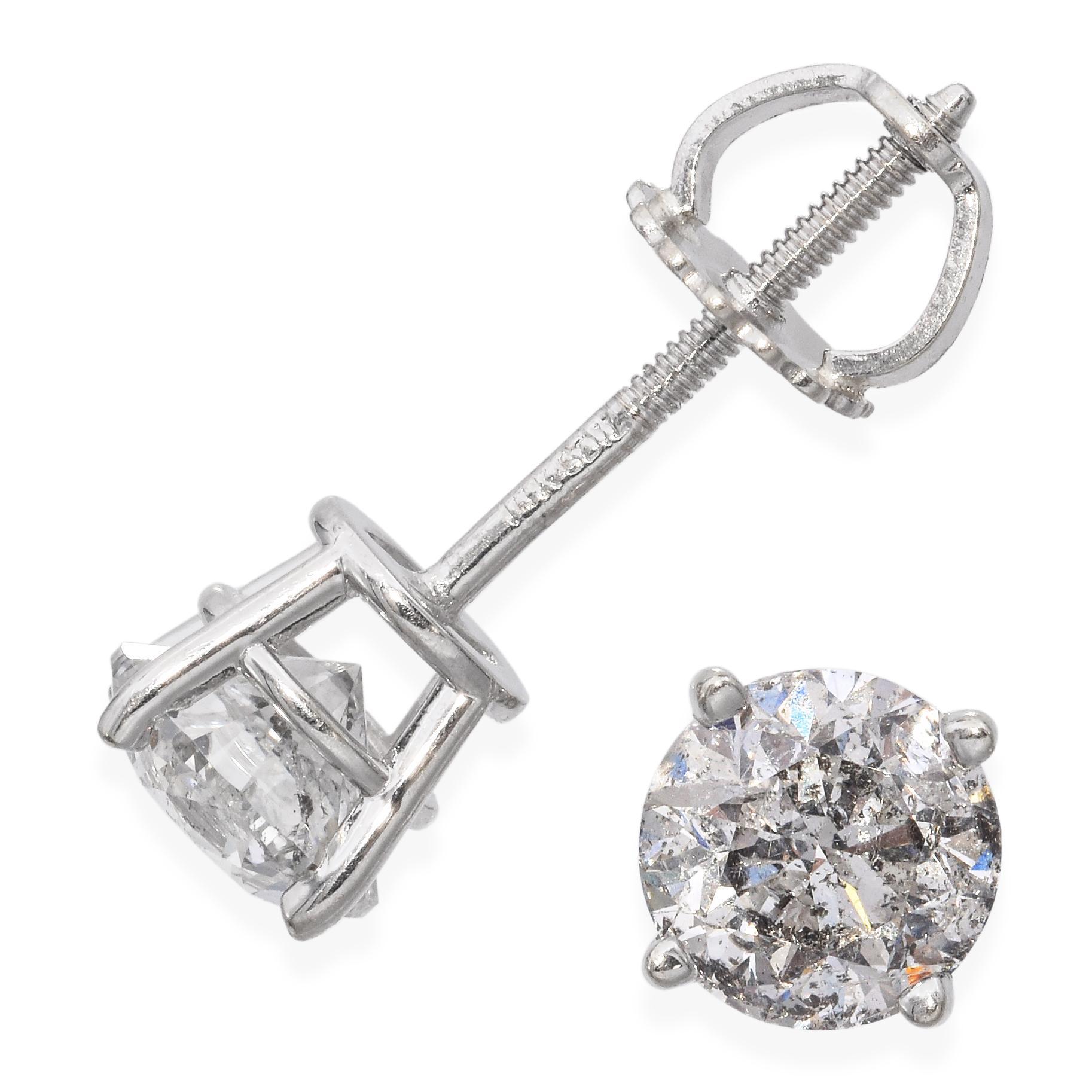 Exquisite and timeless, these stud earrings showcase brilliant round white diamonds, with a total diamond weight of 0.92 carats. Crafted in luxurious 14k white gold, they offer a sophisticated and enduring elegance.

Weight: 0.9 Grams
Stone: 0.92