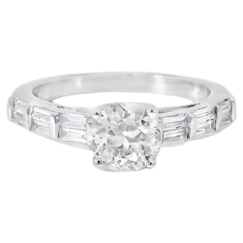14k White gold 0.93ctw Baguette Cut accented by 1.01ctw Round Brilliant Ring