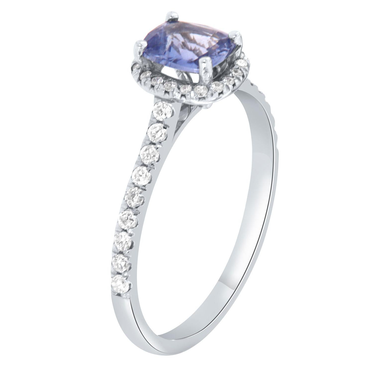 This delicate 14k white gold ring features a 0.95-Carat natural Non-Heated Elongated Cushion shape Sri-Lankan Sapphire encircled by a halo of brilliant round diamonds on top of a 1.8 MM wide diamond band.
This beautiful Sapphire exhibits a vibrant