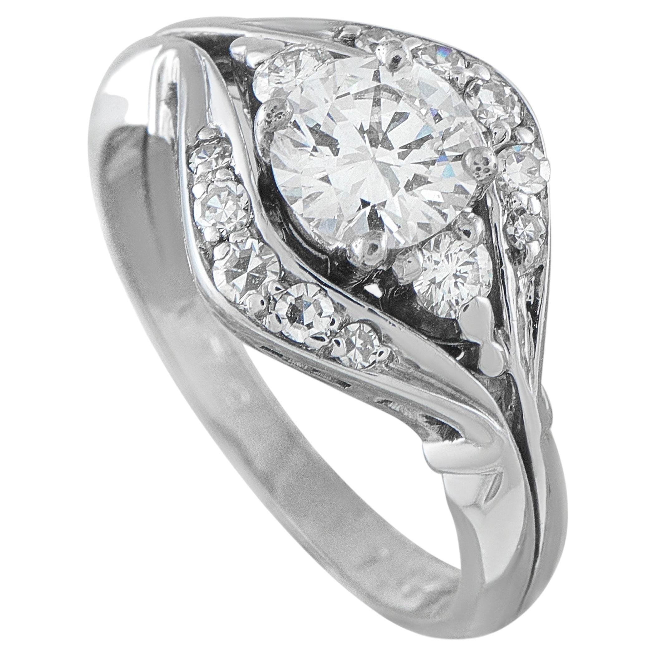 Bague en or blanc 14 carats avec un diamant de 0,95 ct MF11-070126