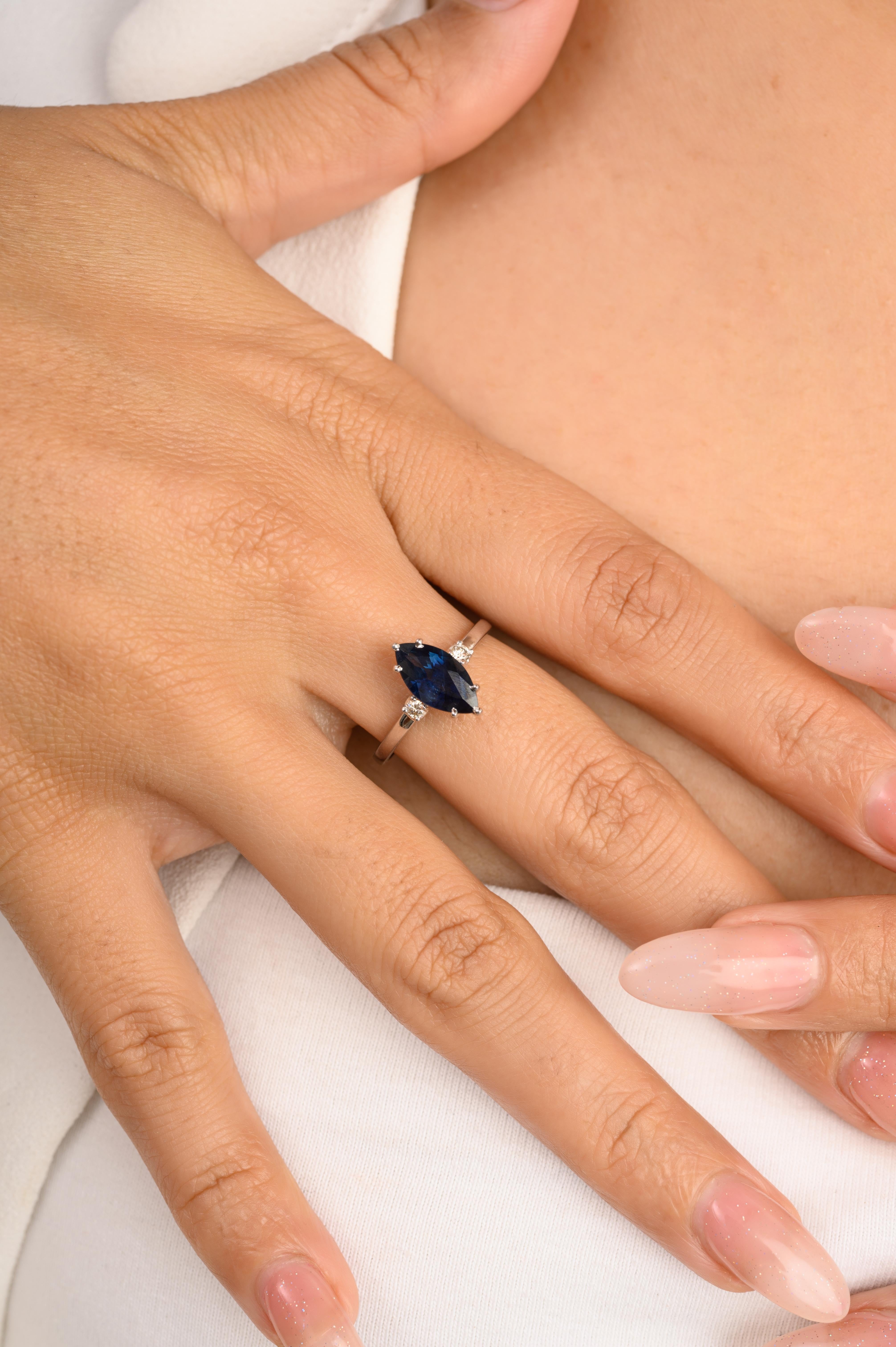 For Sale:  14k White Gold 0.96 Carat Marquise Blue Sapphire and Diamond Engagement Ring 2