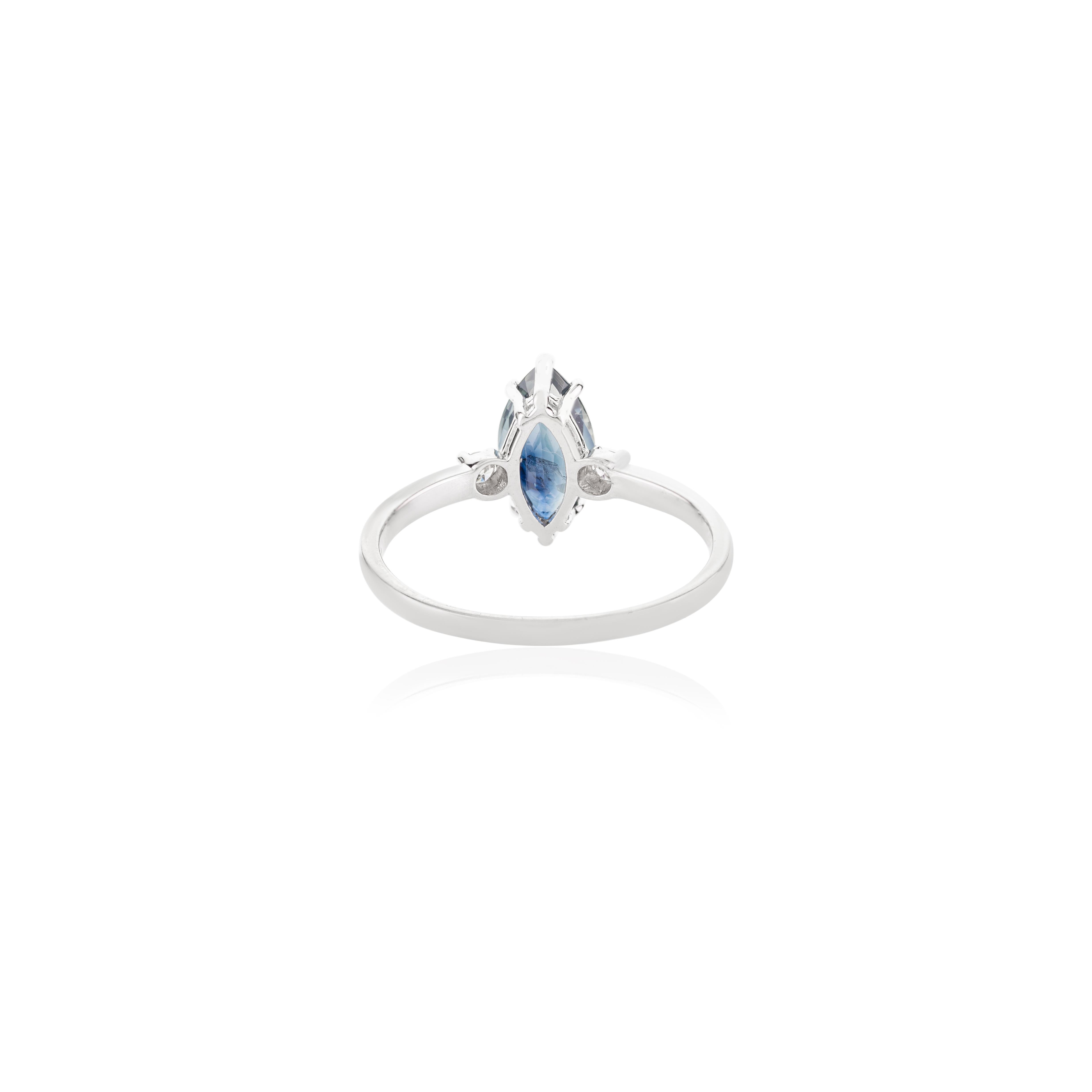 For Sale:  14k White Gold 0.96 Carat Marquise Blue Sapphire and Diamond Engagement Ring 6