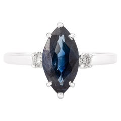 Verlobungsring aus 14 Karat Weißgold mit 0,96 Karat blauem Marquise-Saphir und Diamant