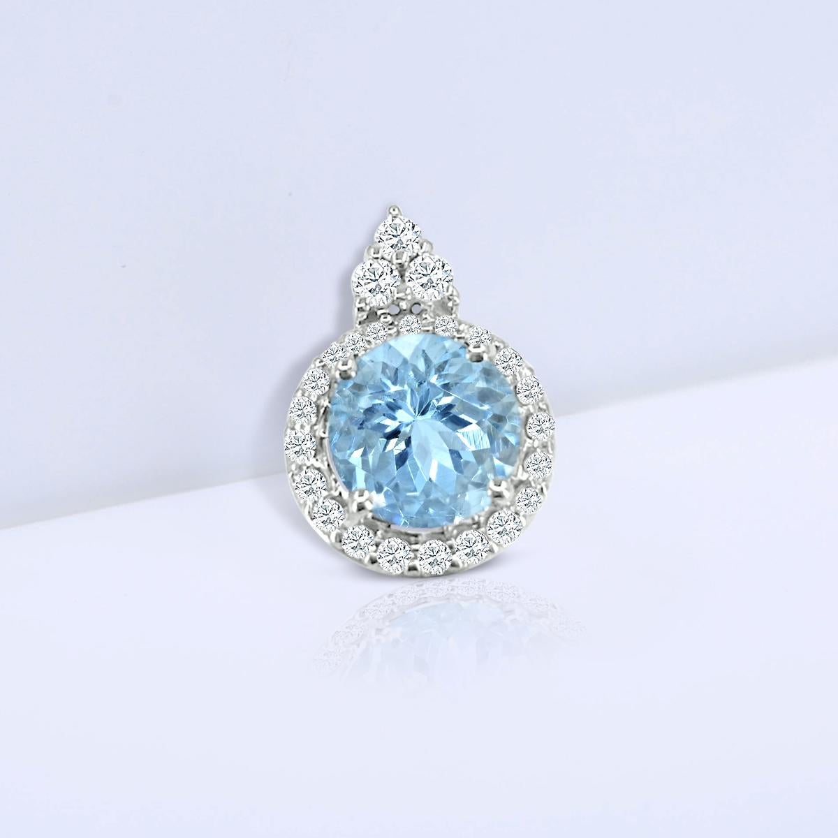 A Gorgeous Round Aquamarine 6.5mm Mounted With Round Diamonds Looks Splendid When Hung Around The Neck.
The Blue Illumination Of Aquamarine When Fused With White Diamonds Caters It A Divine Appearance When Worn During Any Special Occasion.
This